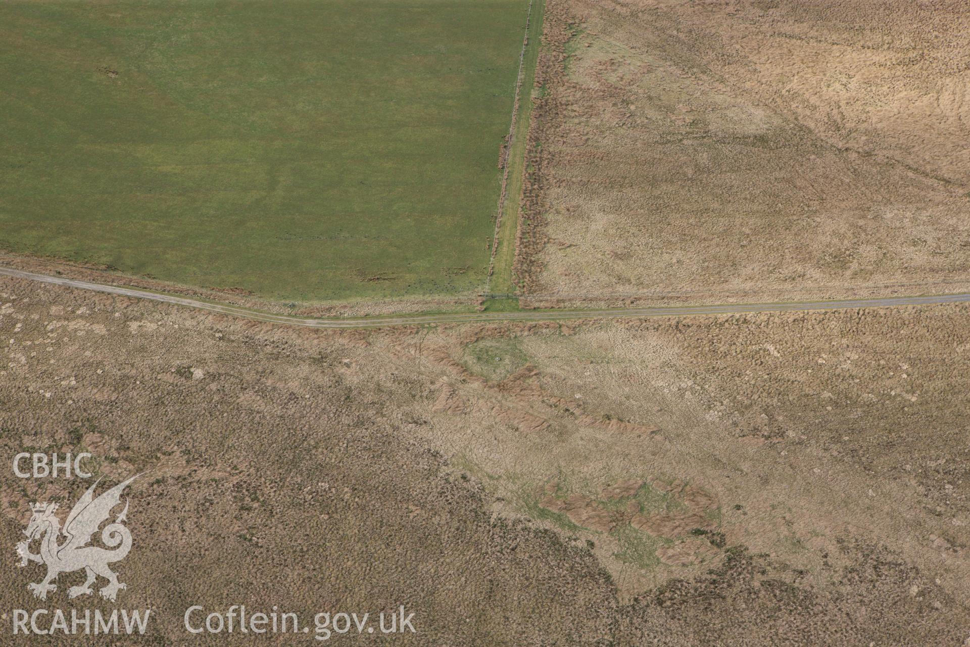 RCAHMW colour oblique photograph of Pen-y-Groes Uchaf, cairn. Taken by Toby Driver on 22/03/2011.