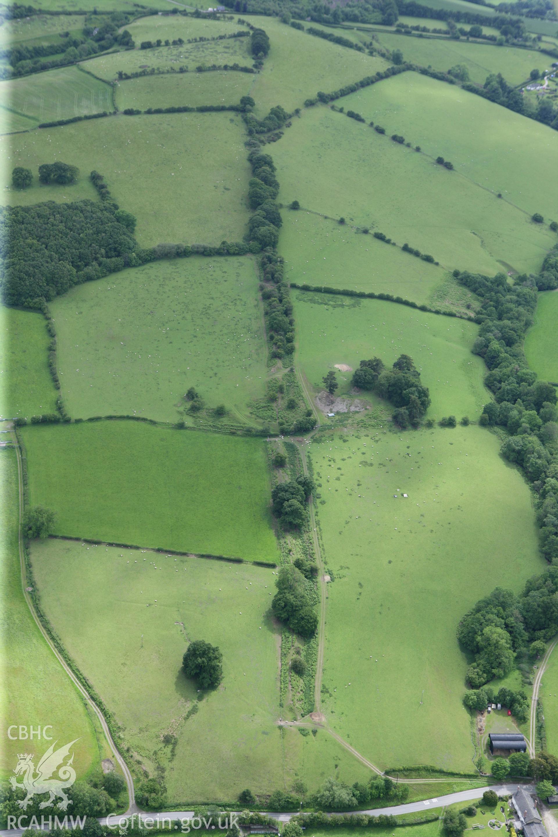 RCAHMW colour oblique photograph of Offa's Dyke, section extending 1960m from Yew Tree Farm to quarries NE of Granner Wood. Taken by Toby Driver on 13/06/2011.