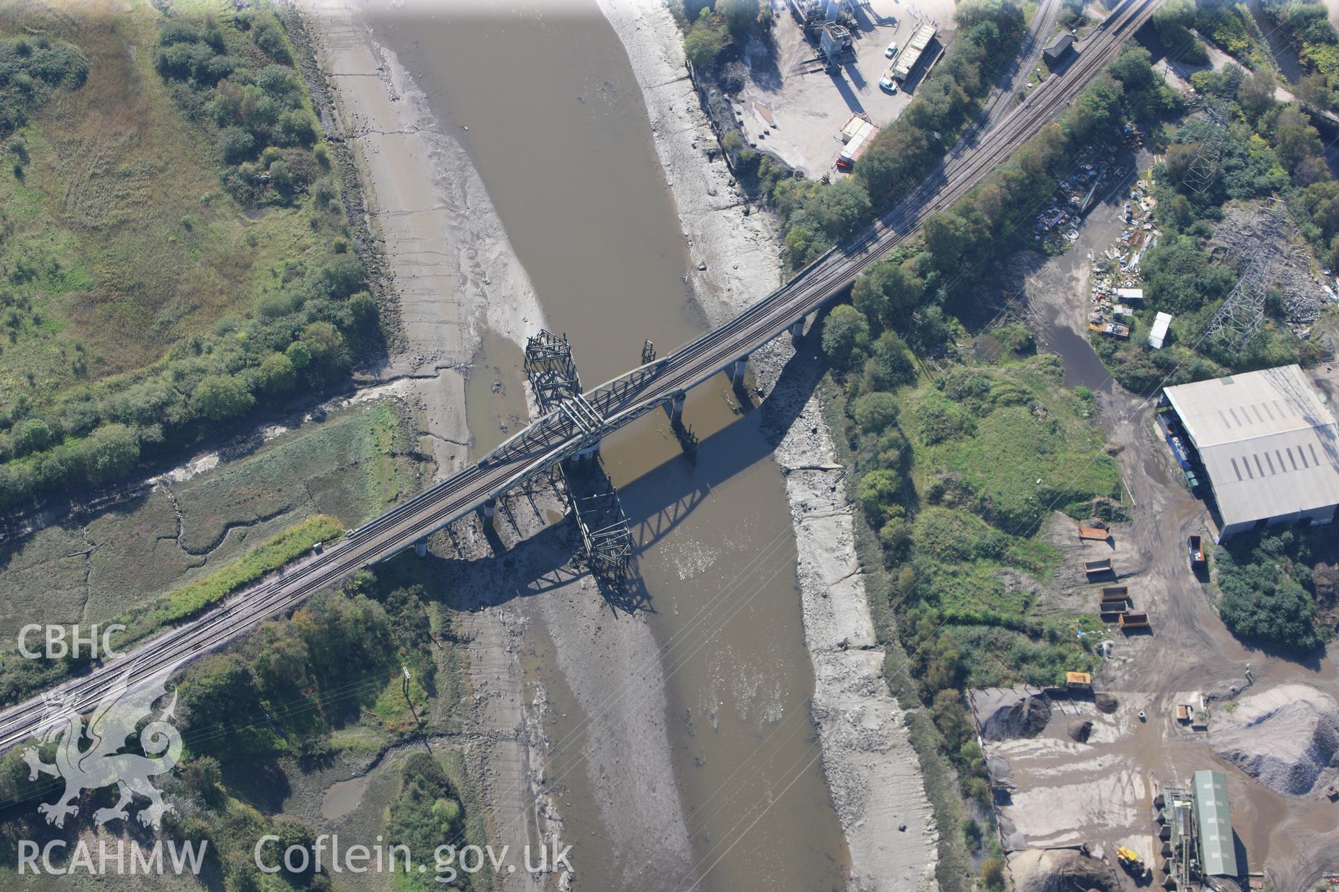 RCAHMW colour oblique photograph of railway swing bridge over the River Neath, between Coedffranc and Briton Ferry. Taken by Toby Driver and Oliver Davies on 28/09/2011.