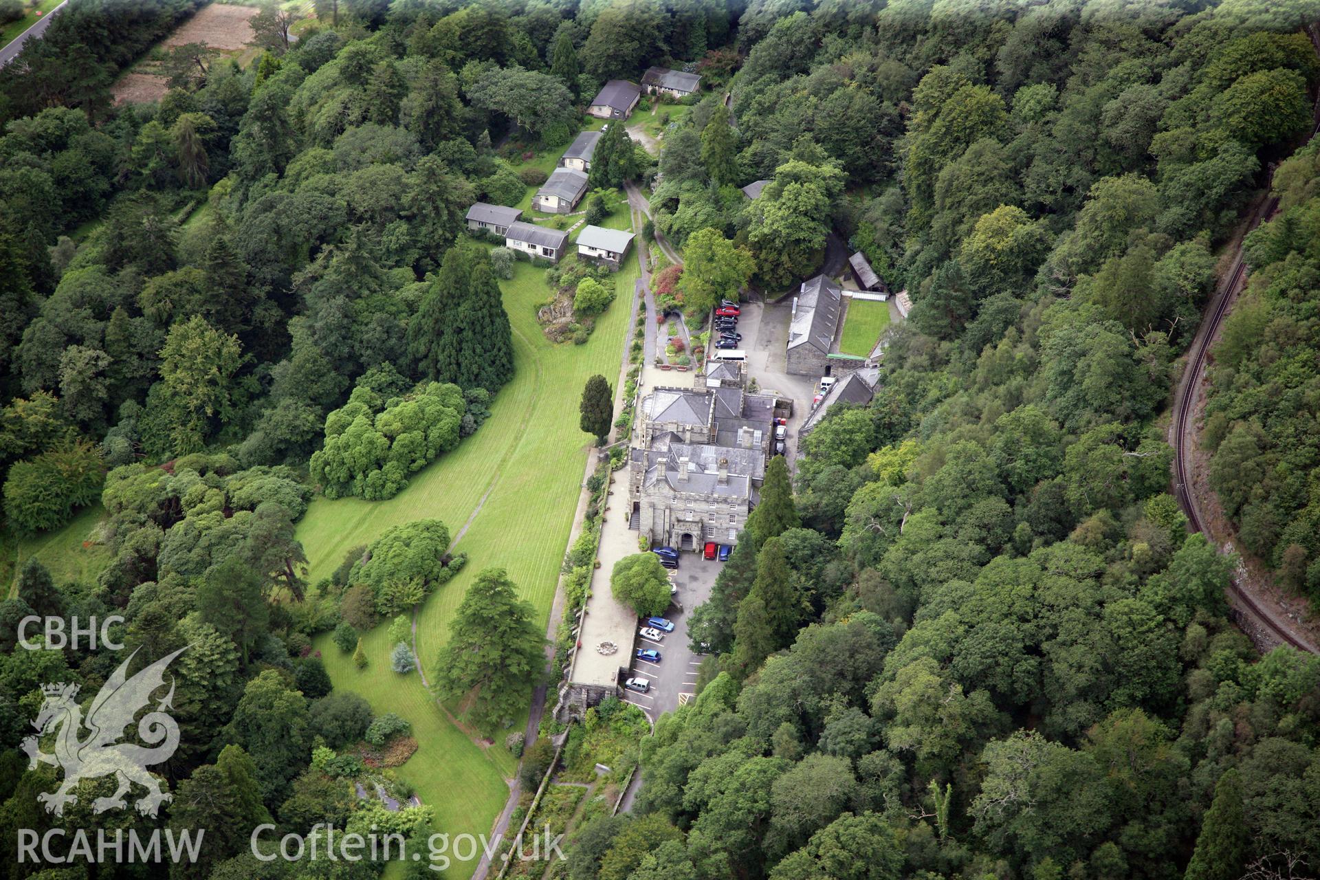 RCAHMW colour oblique photograph of Plas Tan-y-bwlch, house and gardens. Taken by Toby Driver on 17/08/2011.