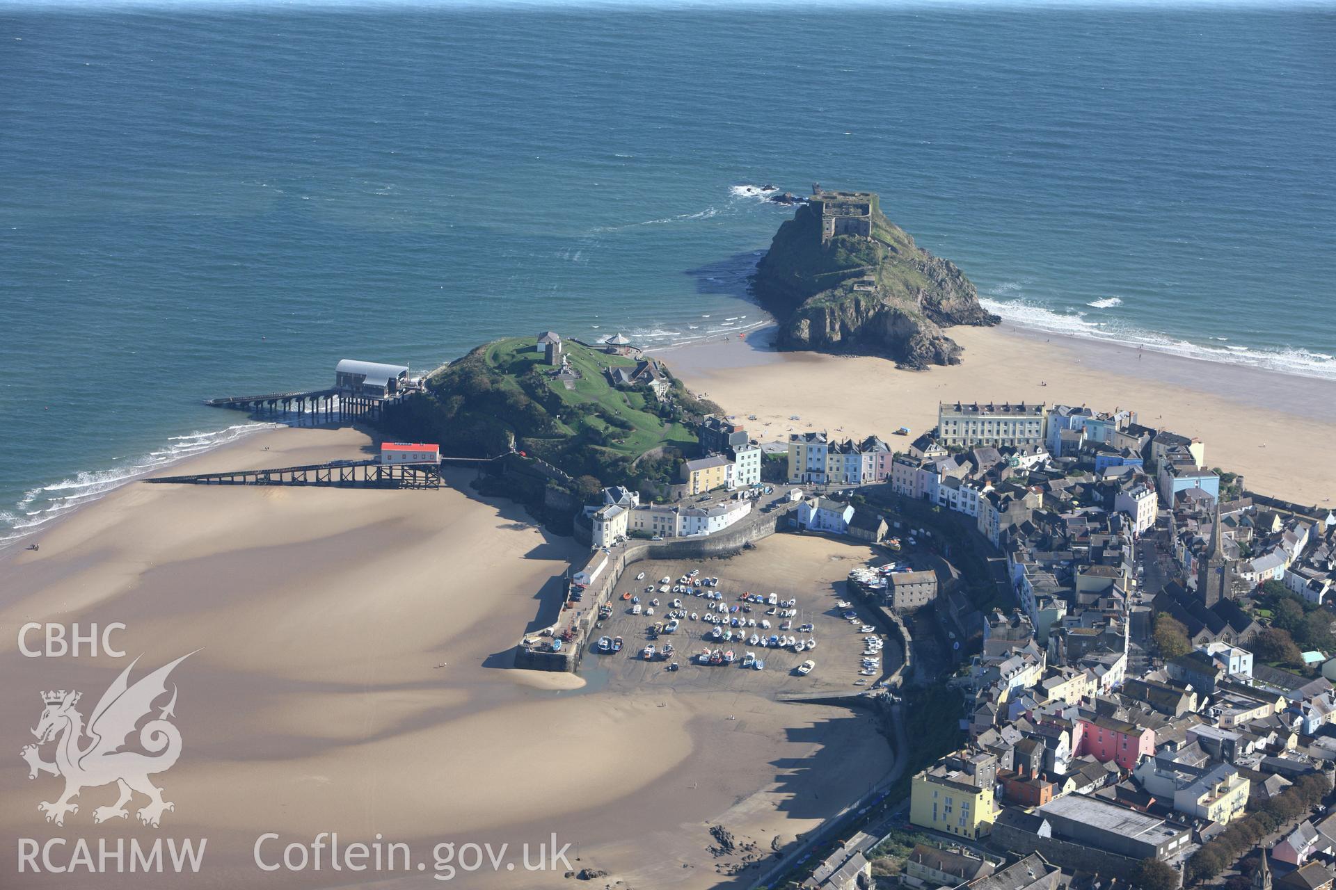 RCAHMW colour oblique photograph of Tenby harbour and Tenby Castle, viewed from the north-west. Taken by Toby Driver and Oliver Davies on 28/09/2011.