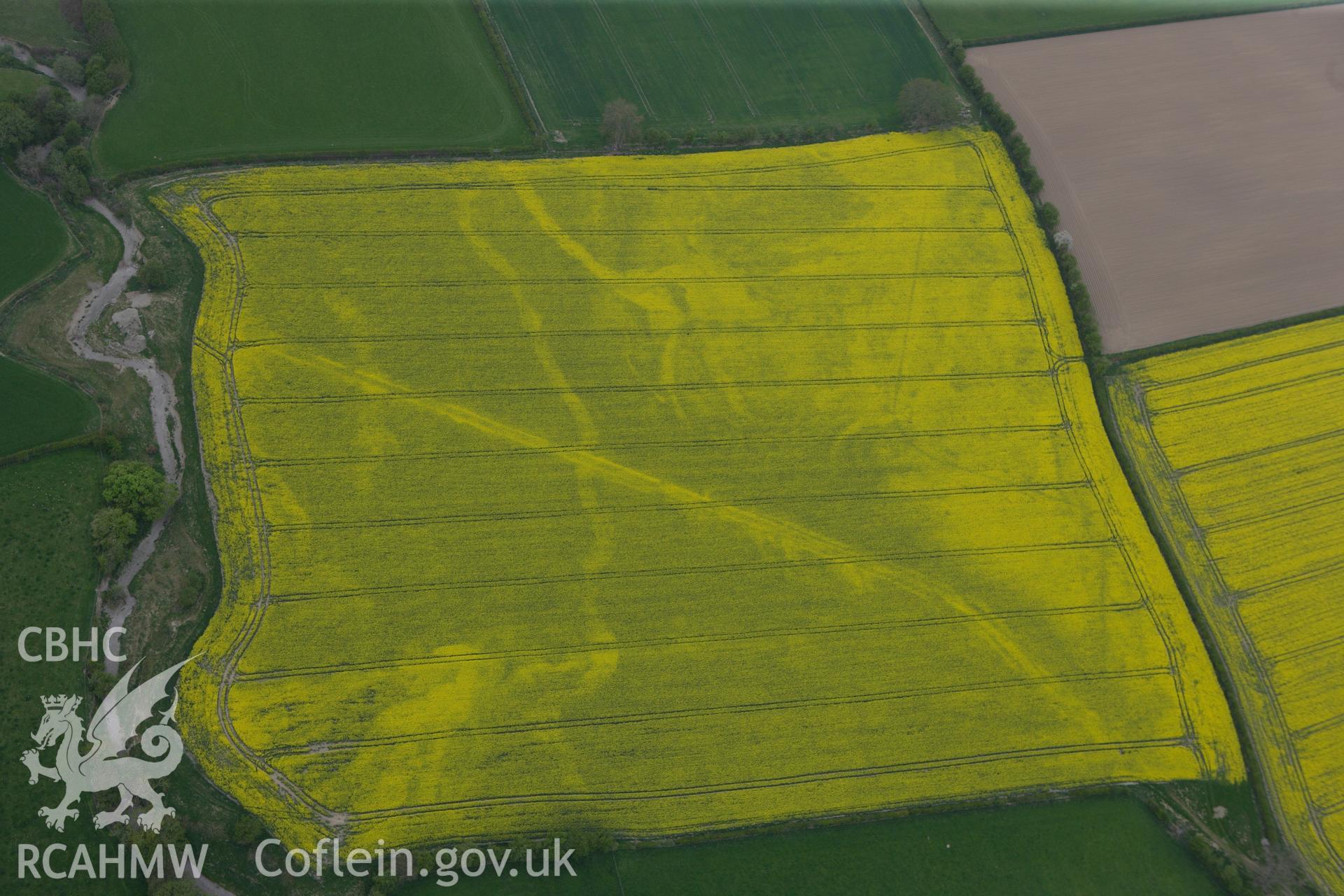 RCAHMW colour oblique photograph of Hindwell Marching Camp 1. Taken by Toby Driver on 26/04/2011.