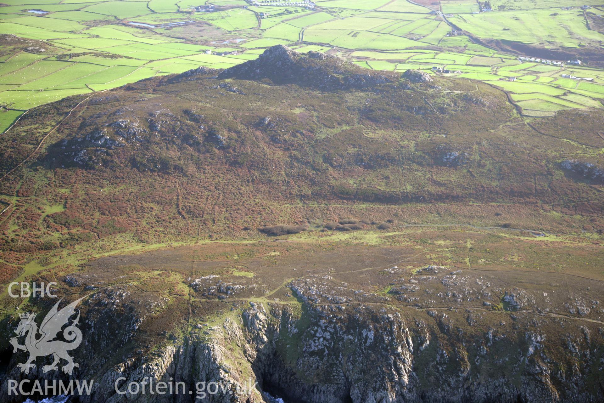 RCAHMW colour oblique photograph of Carn Llidi enclosures;Penmaen Dewi field system, St David's Head. Taken by O. Davies & T. Driver on 22/11/2013.