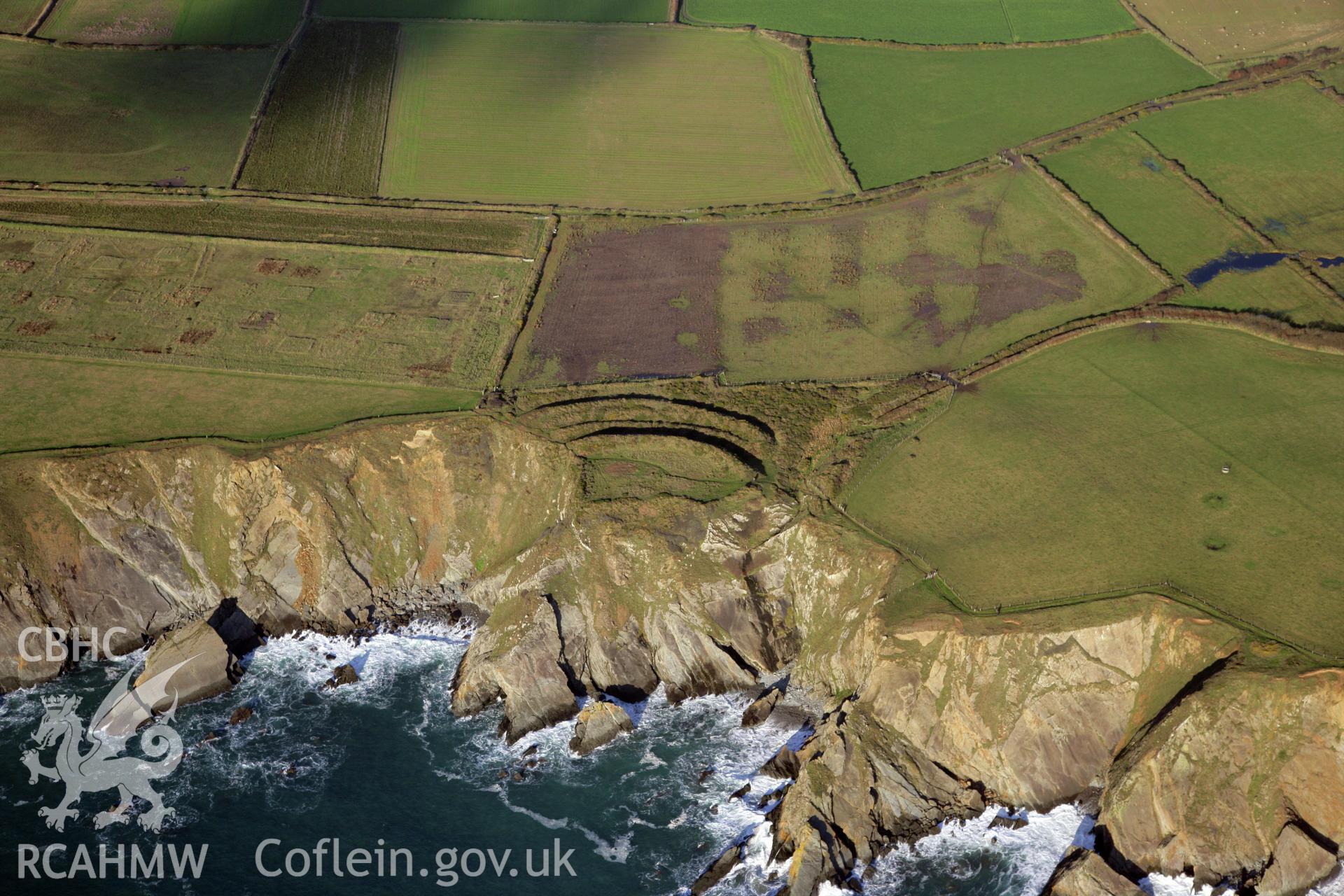 RCAHMW colour oblique photograph of Marloes Sound Rath promontory fort, viewed from the south. Taken by O. Davies & T. Driver on 22/11/2013.