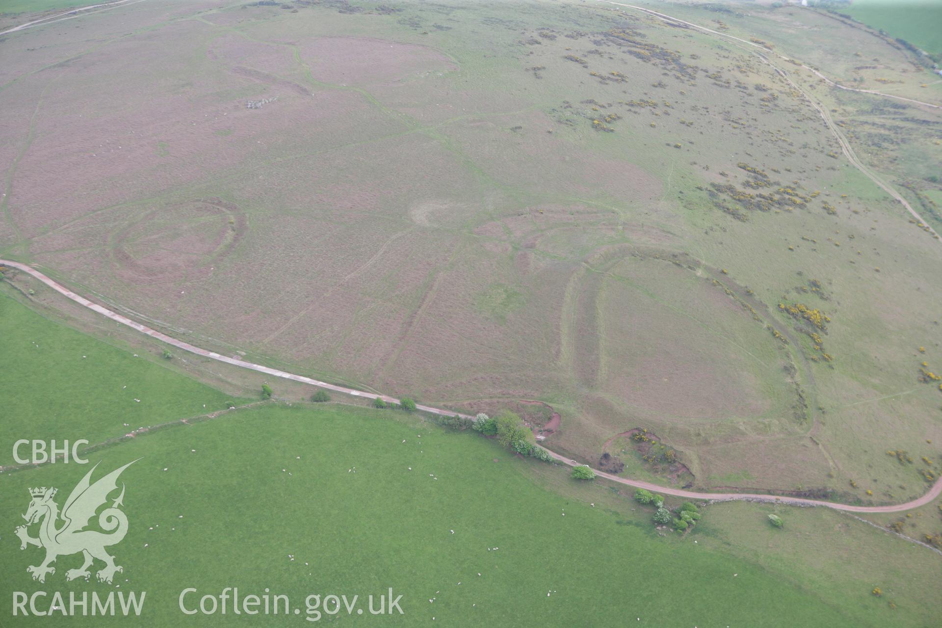 RCAHMW colour oblique photograph of Hardings Down North enclosure. Taken by Toby Driver and Oliver Davies on 04/05/2011.