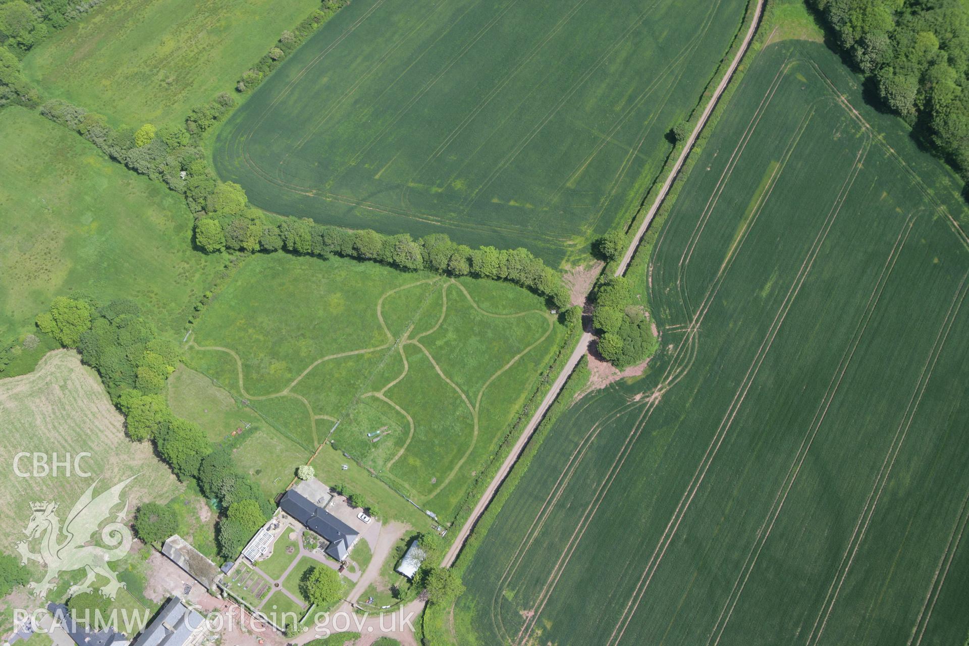 RCAHMW colour oblique photograph of Cropmarks east of Butterhill Farm. Taken by Toby Driver on 24/05/2011.