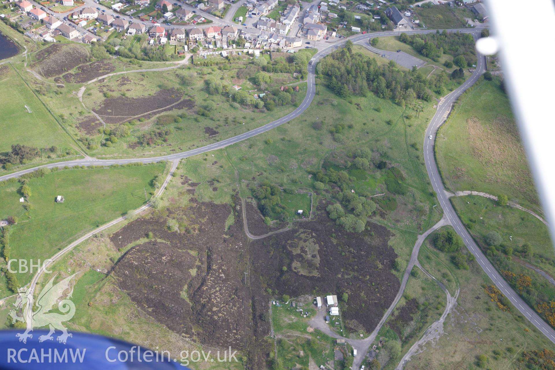 RCAHMW colour oblique photograph of Upper Brick Yard, clay pits, view from west. Taken by Toby Driver on 22/05/2012.