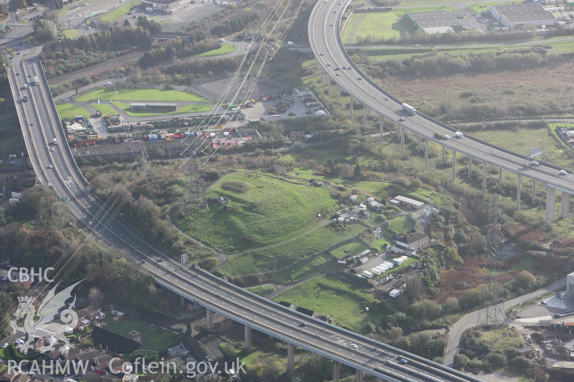 RCAHMW colour oblique photograph of Warren Hill Enclosure. Taken by Toby Driver on 17/11/2011.