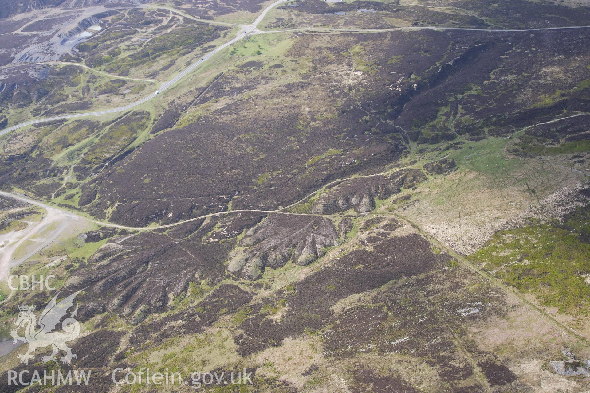 RCAHMW colour oblique photograph of Pen-ffordd-goch iron and coal workings and patching. Taken by Toby Driver on 22/05/2012.