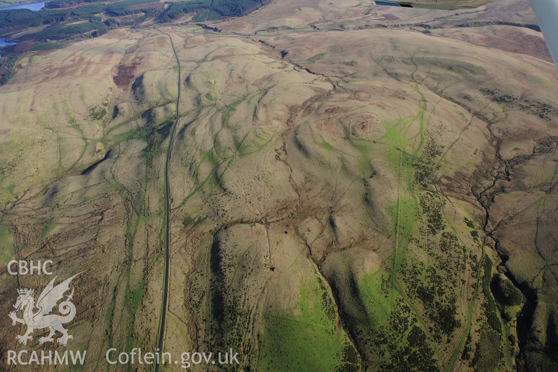 RCAHMW colour oblique photograph of Arosfa Garreg Lwyd Roman camp. Taken by Toby Driver on 23/11/2012.