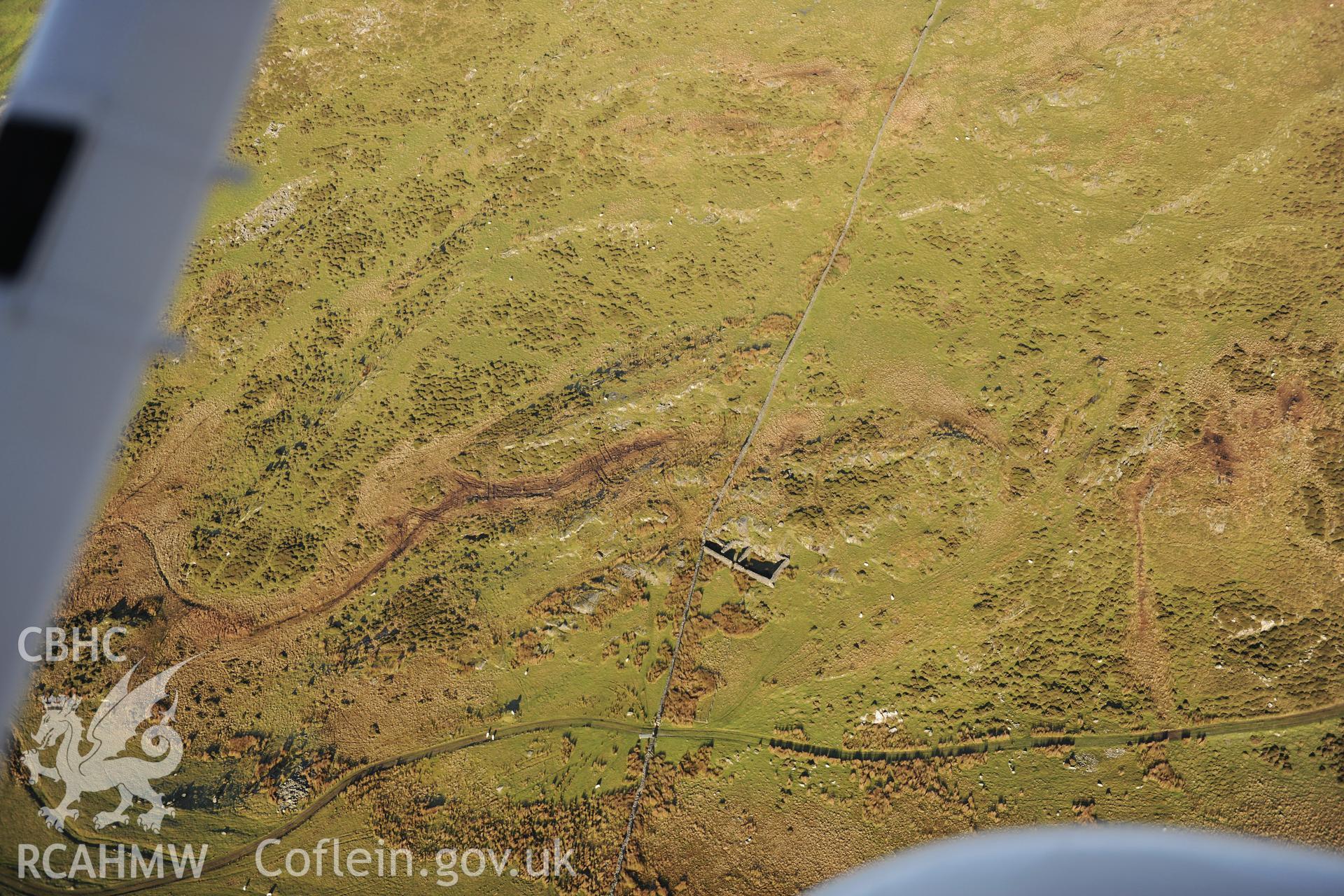 RCAHMW colour oblique photograph of Moel Goedog, enclosed homestead. Taken by Toby Driver on 10/12/2012.