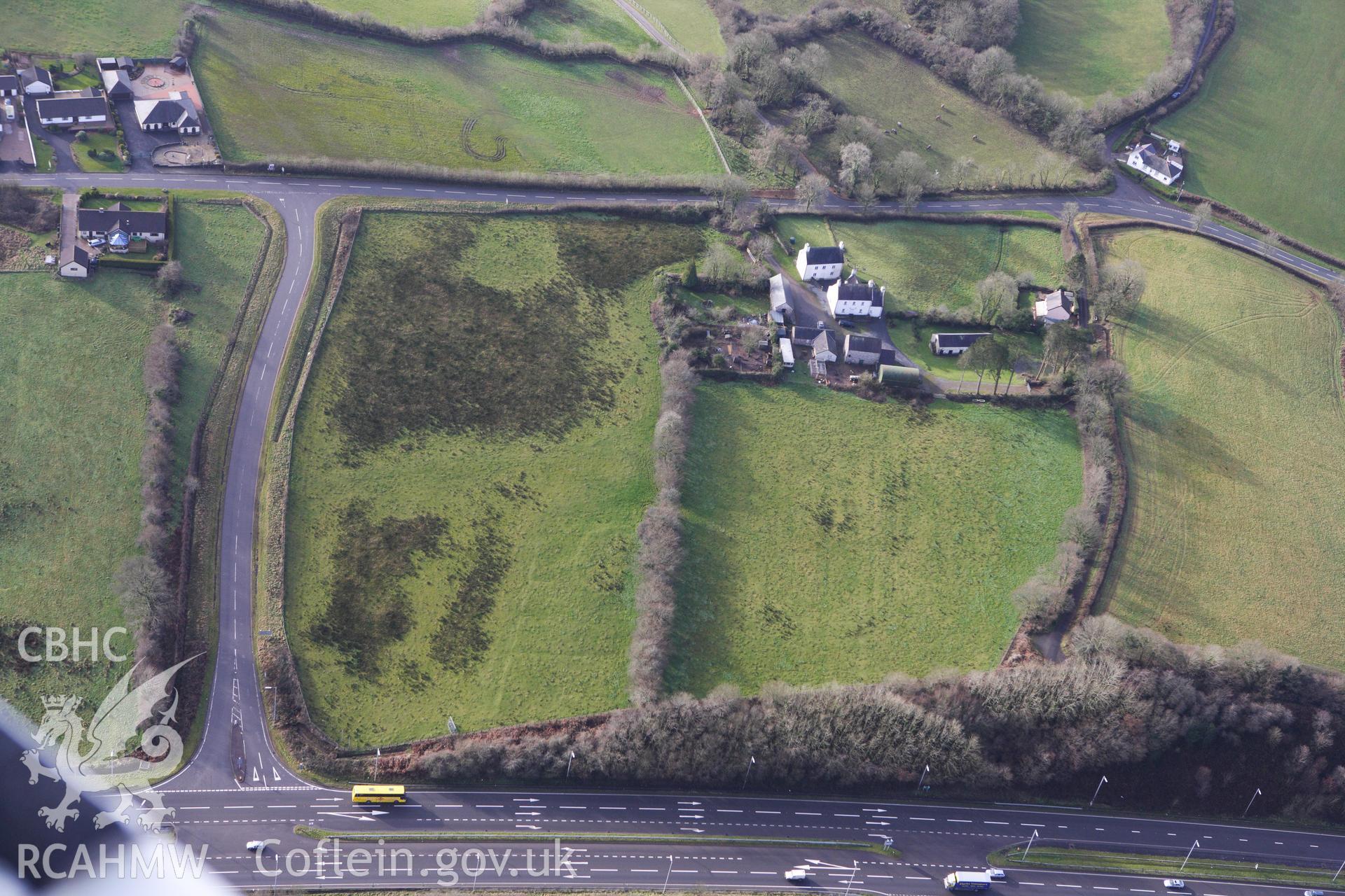 RCAHMW colour oblique photograph of Ring Cairn, north-east of Heol Ddu. Taken by Toby Driver on 27/01/2012.