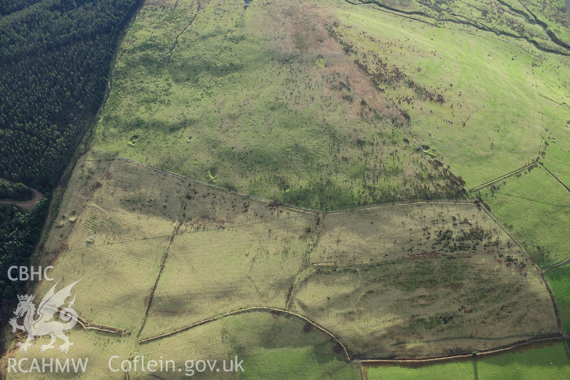 RCAHMW colour oblique photograph of Foel Fynyddau, deserted rural settlement west of scheduled remains. Taken by Toby Driver on 28/11/2012.