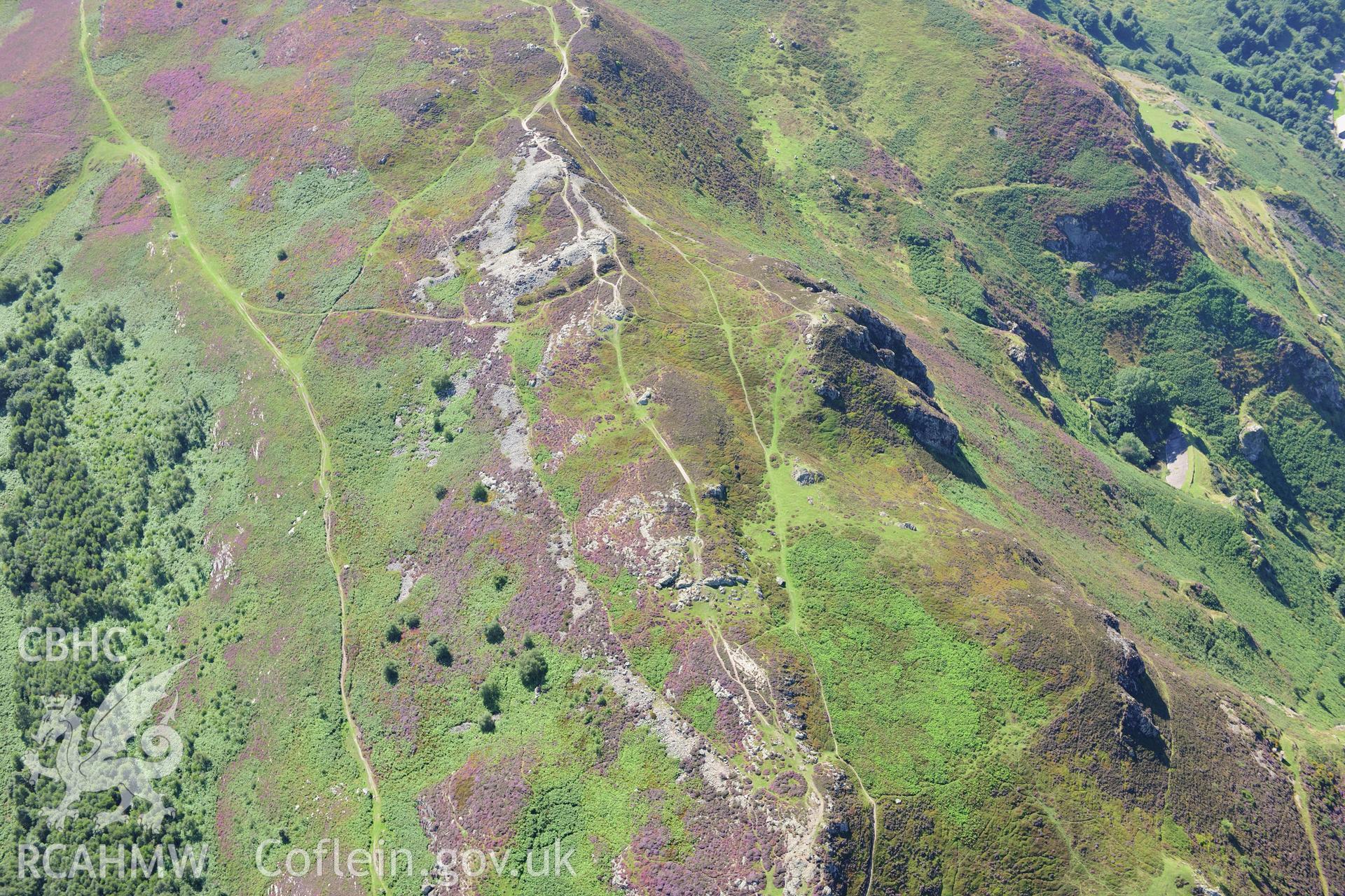 RCAHMW colour oblique photograph of Castell Caer Seion hill fort, landscape view. Taken by Toby Driver on 10/08/2012.