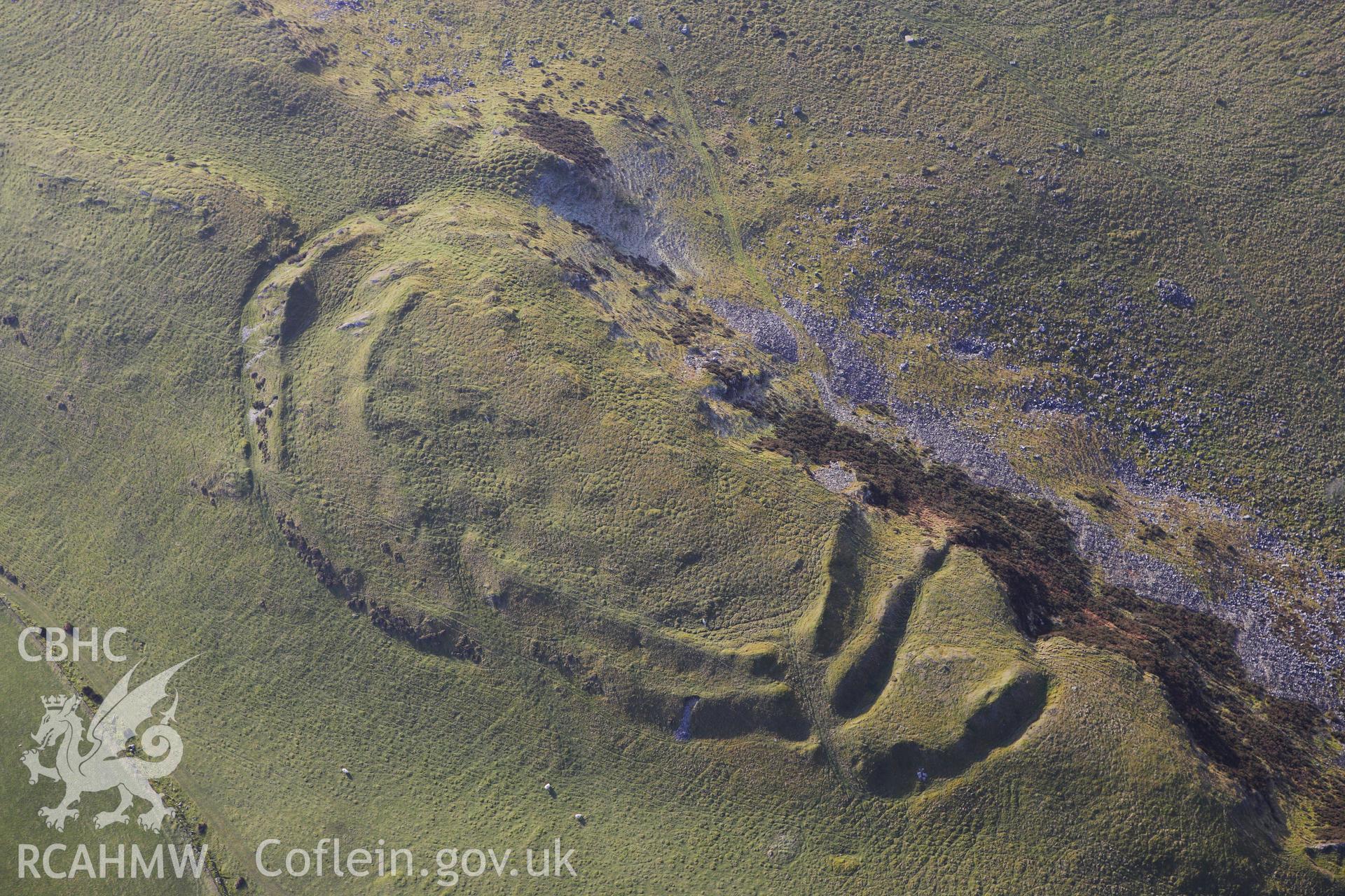 RCAHMW colour oblique photograph of Pen-Y-Ffrwyd Llwyd Hillfort. Taken by Toby Driver on 07/02/2012.