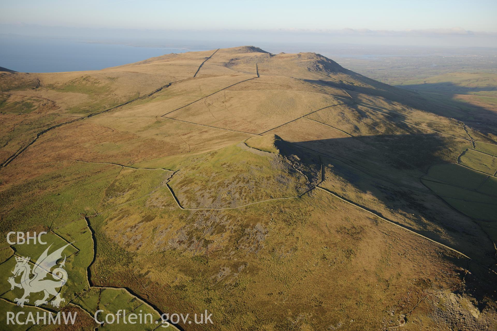 RCAHMW colour oblique photograph of Pen y Gaer hillfort, winter landscape. Taken by Toby Driver on 10/12/2012.