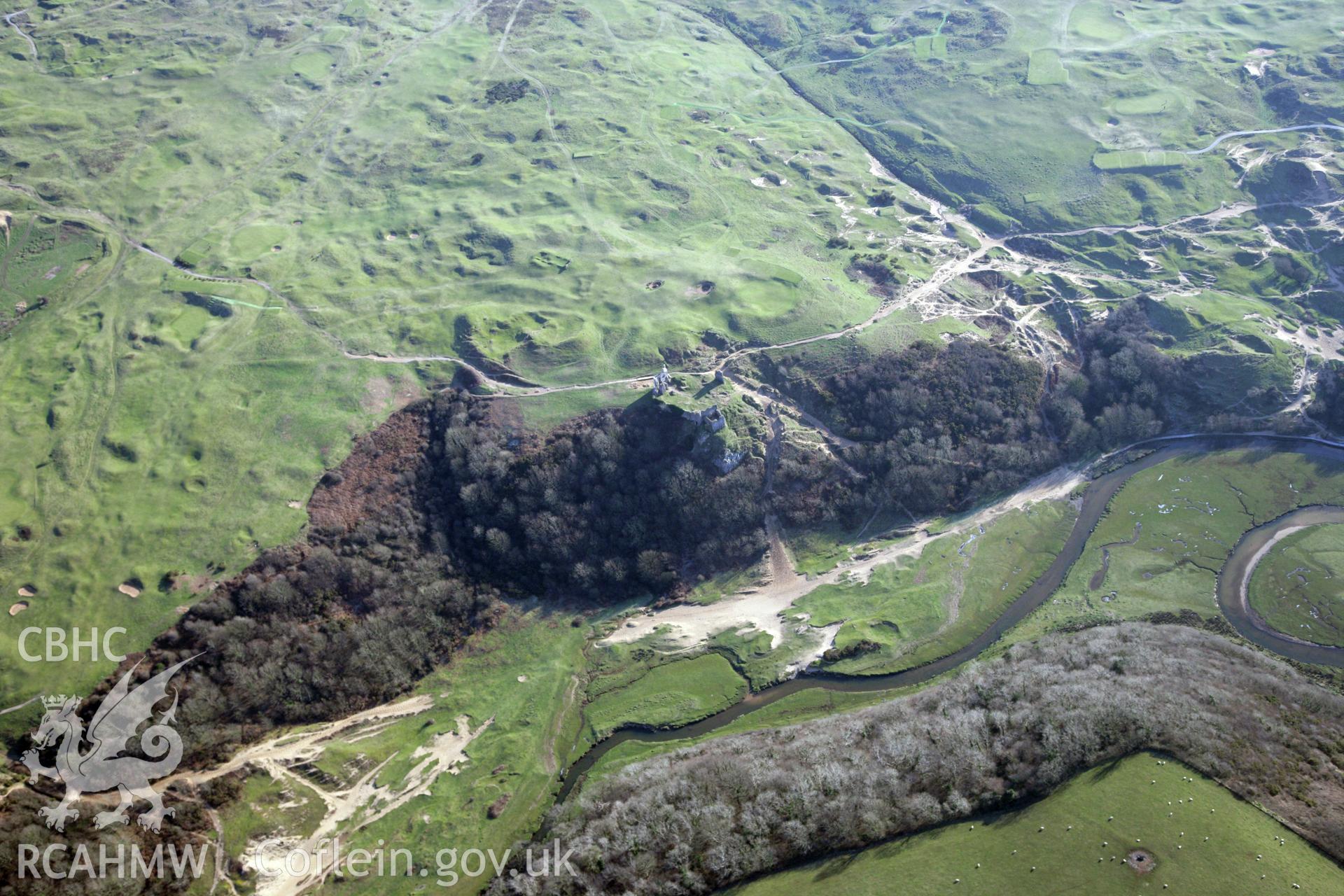 RCAHMW colour oblique photograph of Pennard deserted settlement and Pennard castle and church. Taken by Toby Driver on 02/02/2012.