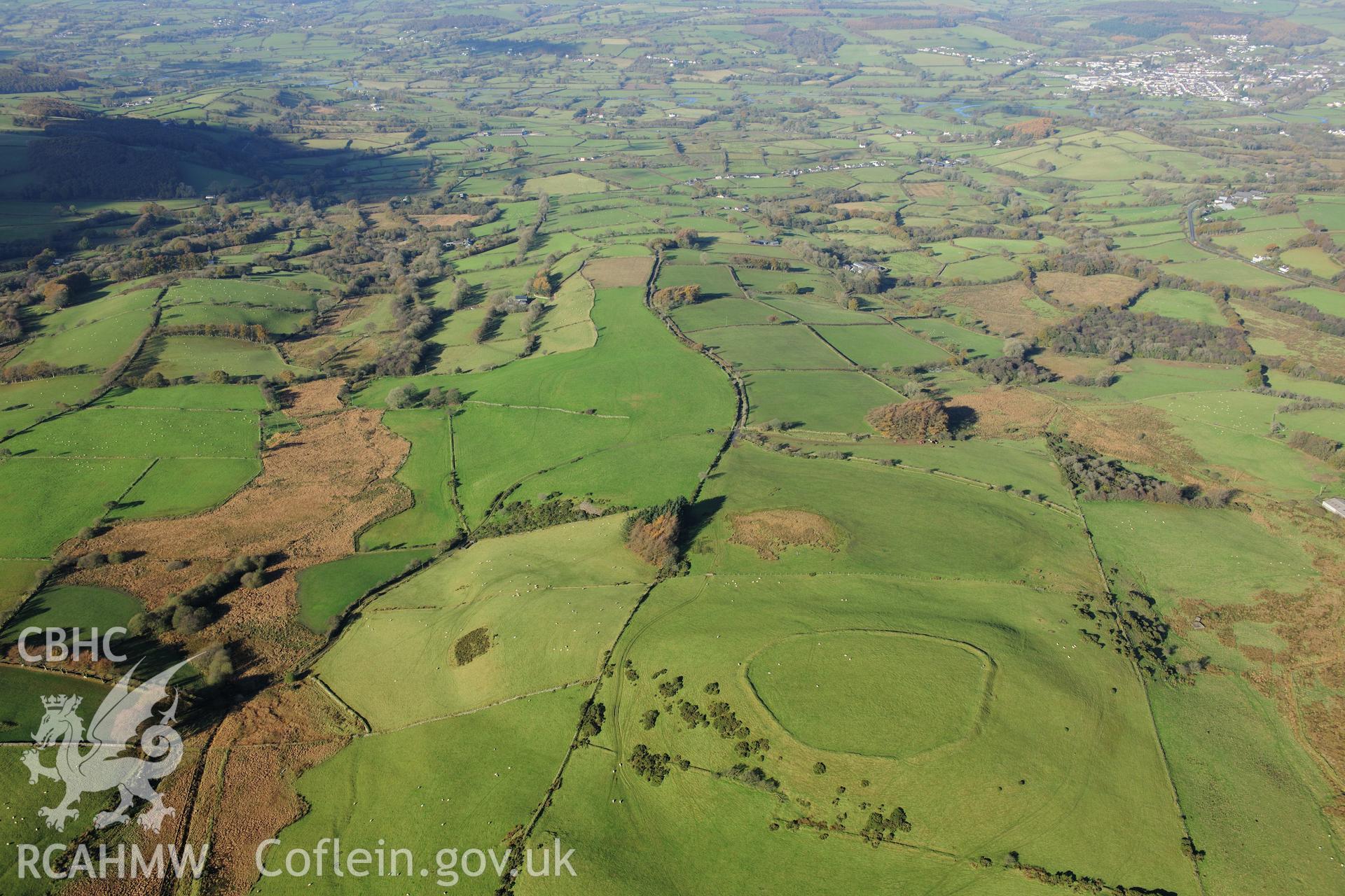 RCAHMW colour oblique photograph of Caer Pencarreg hillfort, landscape view from south-east. Taken by Toby Driver on 05/11/2012.