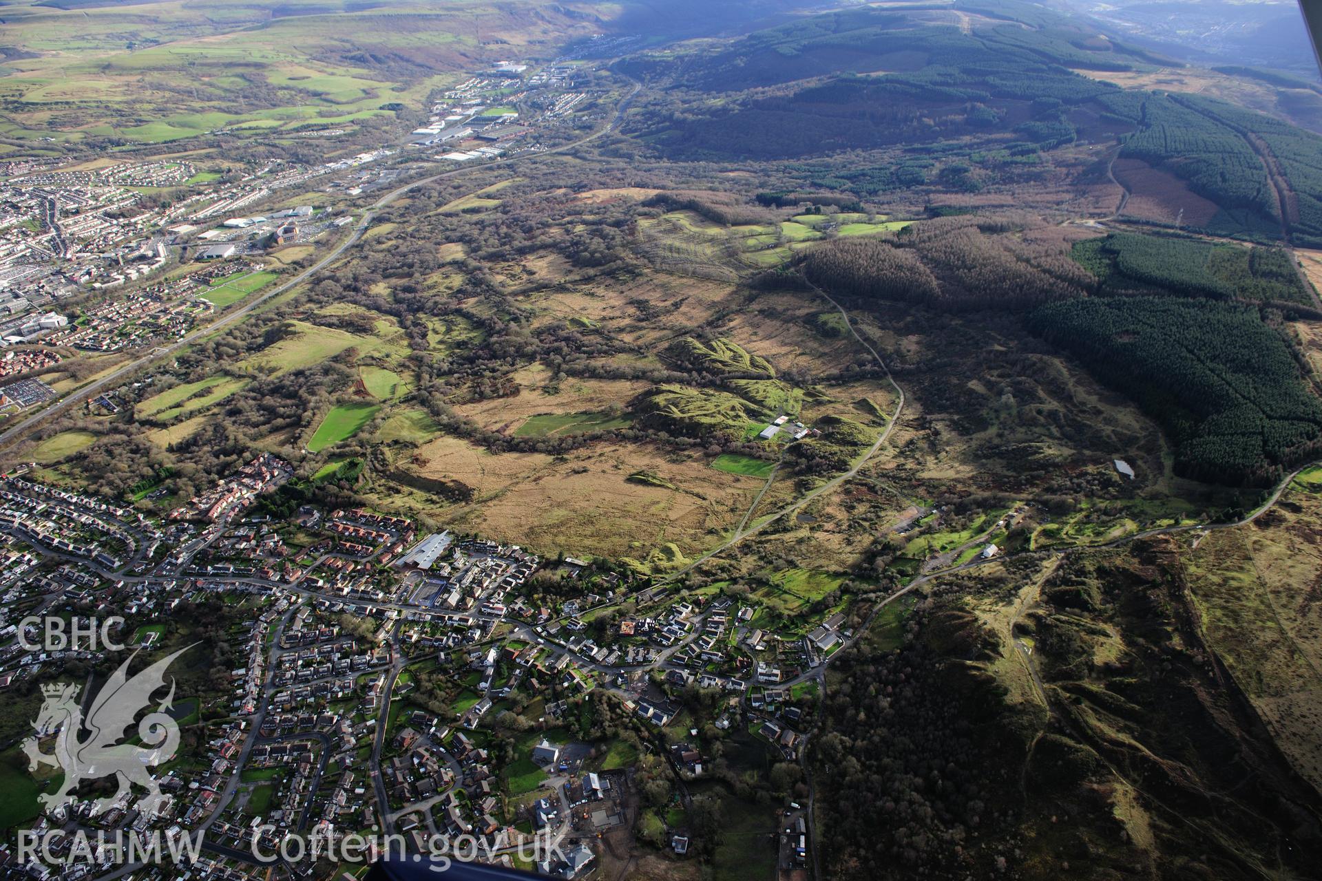 RCAHMW colour oblique photograph of Heolgerrig, view south over Cwmdu Drift Mine, and industrial landscape. Taken by Toby Driver on 28/11/2012.