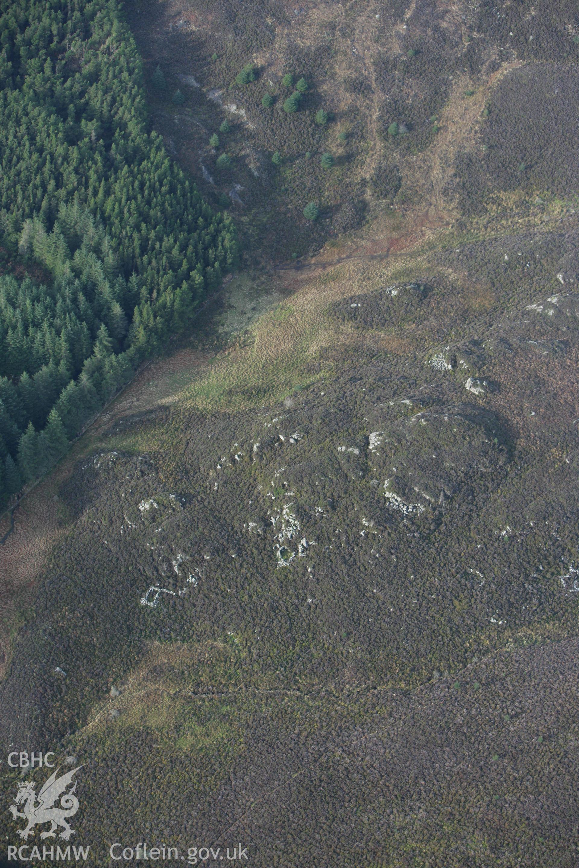 RCAHMW colour oblique photograph of Hut settlement west of Allt Goch. Taken by Toby Driver on 13/01/2012.