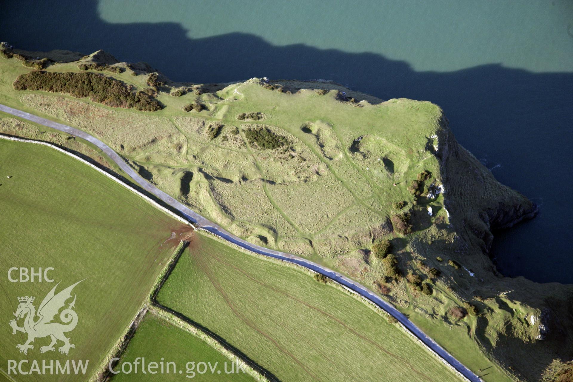 RCAHMW colour oblique photograph of Old Castle Camp. Taken by Toby Driver on 02/02/2012.