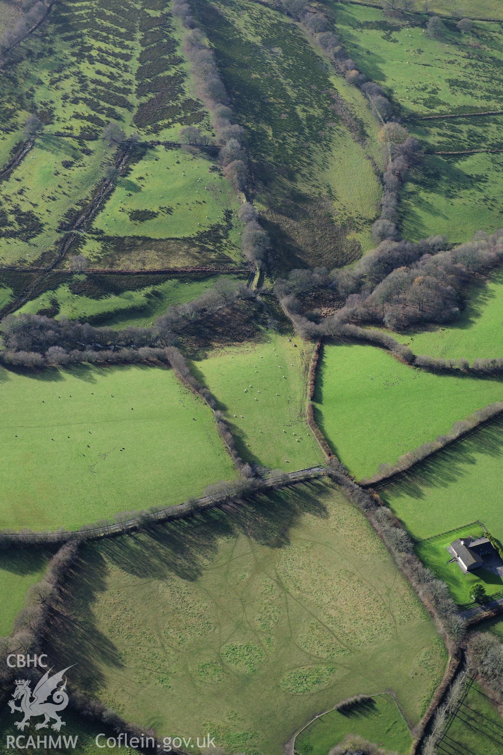 RCAHMW colour oblique photograph of Segment of Roman road north of Tynewydd. Taken by Toby Driver on 23/11/2012.