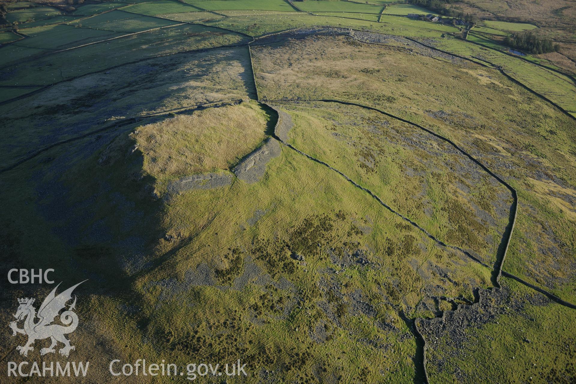 RCAHMW colour oblique photograph of Pen y Gaer hillfort. Taken by Toby Driver on 10/12/2012.