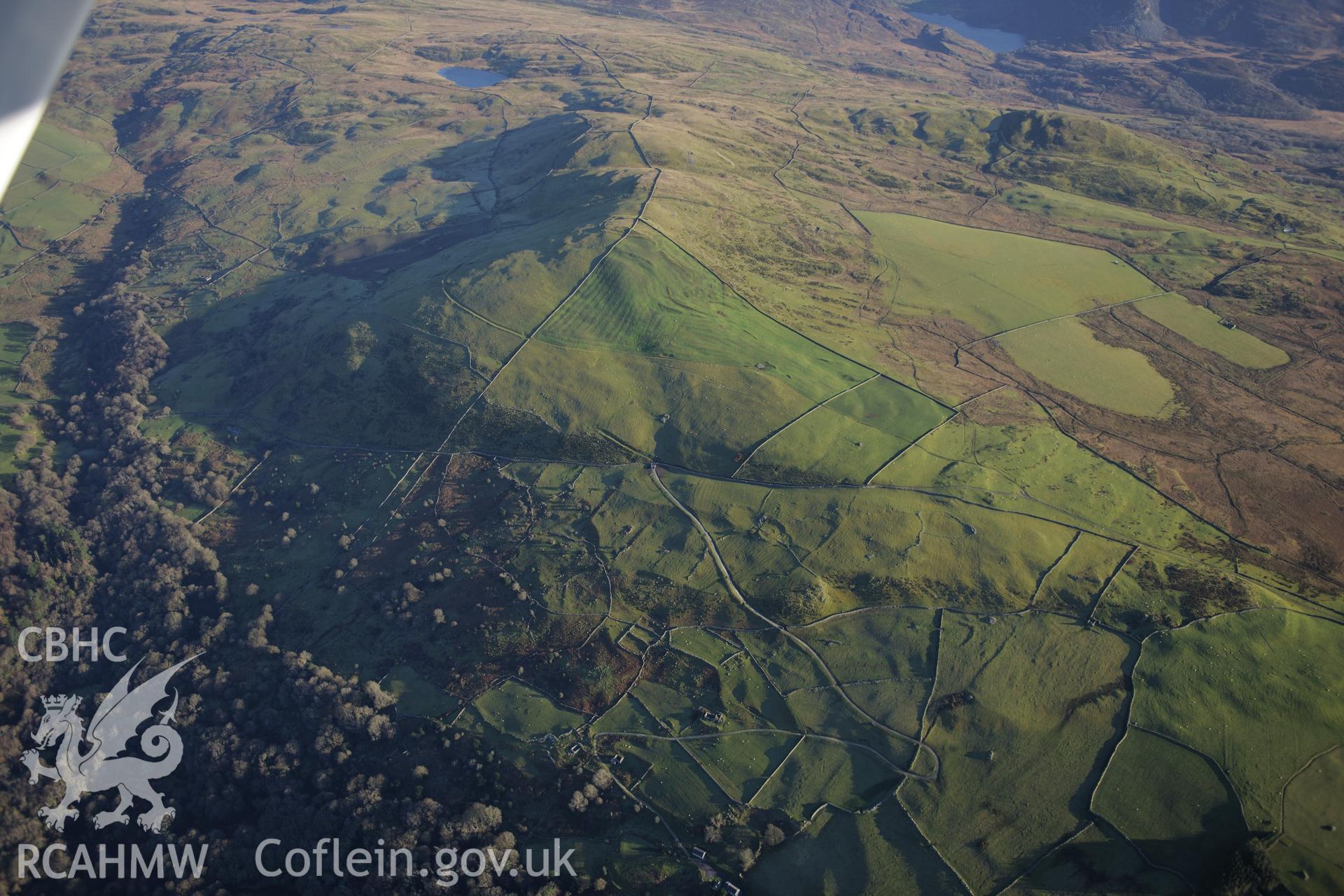 RCAHMW colour oblique photograph of Erw Wen, high upland landscape from the west, with Moel Goedog beyond. Taken by Toby Driver on 10/12/2012.