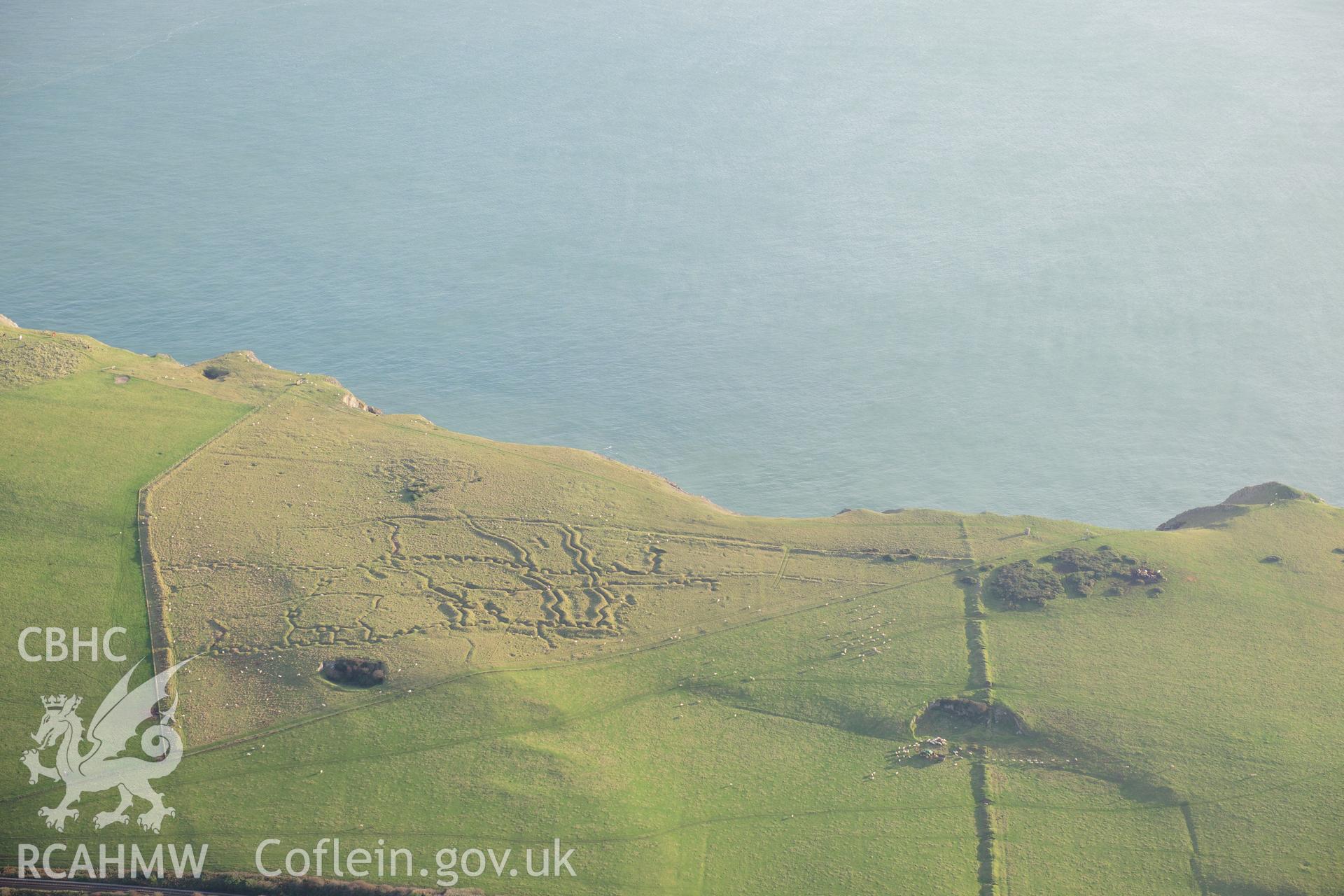 RCAHMW colour oblique photograph of Penally First World War Practice Trenches. Taken by Toby Driver on 26/10/2012.