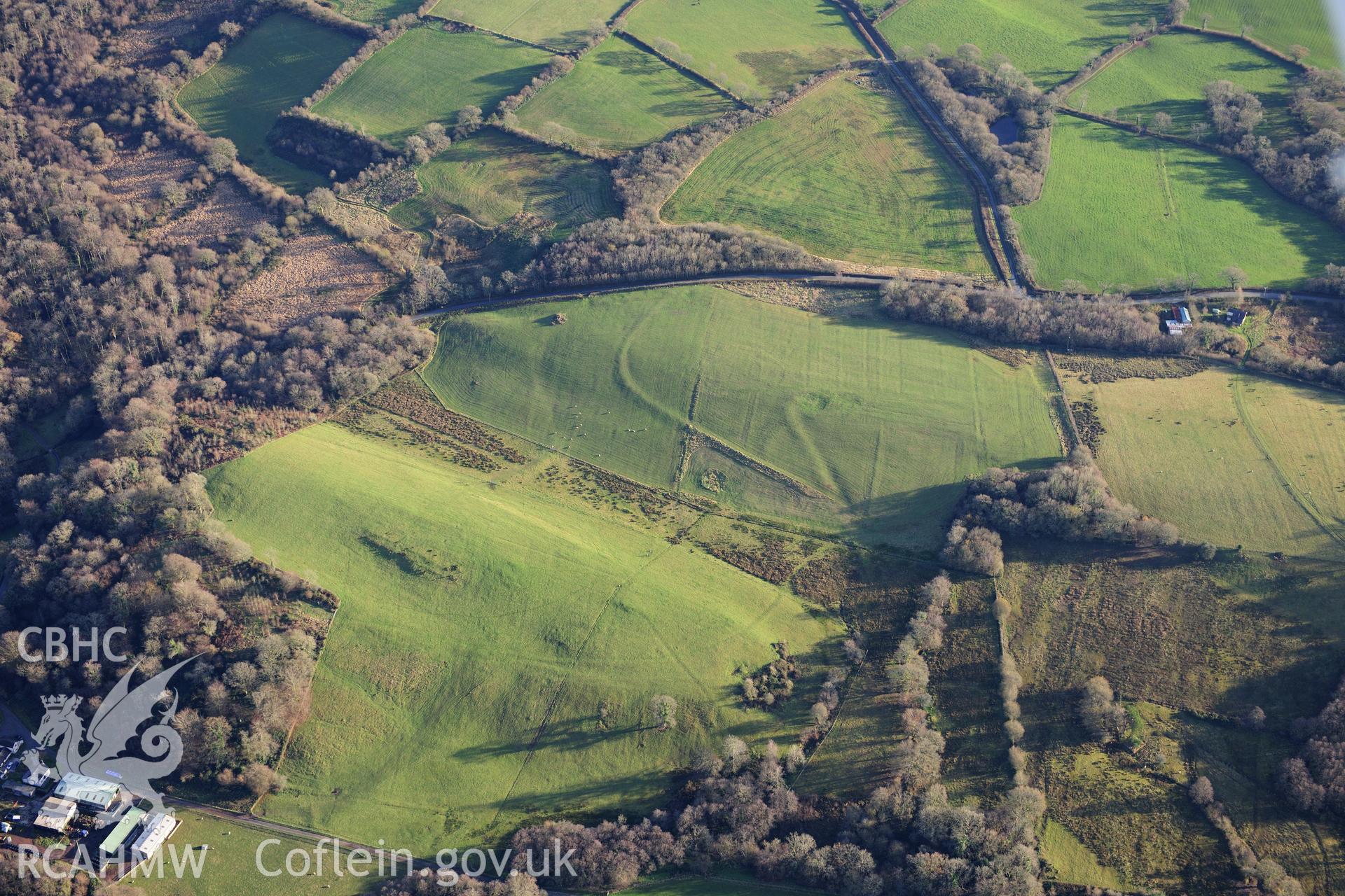 RCAHMW colour oblique photograph of Allt Goch Lodge, earthworks. Taken by Toby Driver on 28/11/2012.