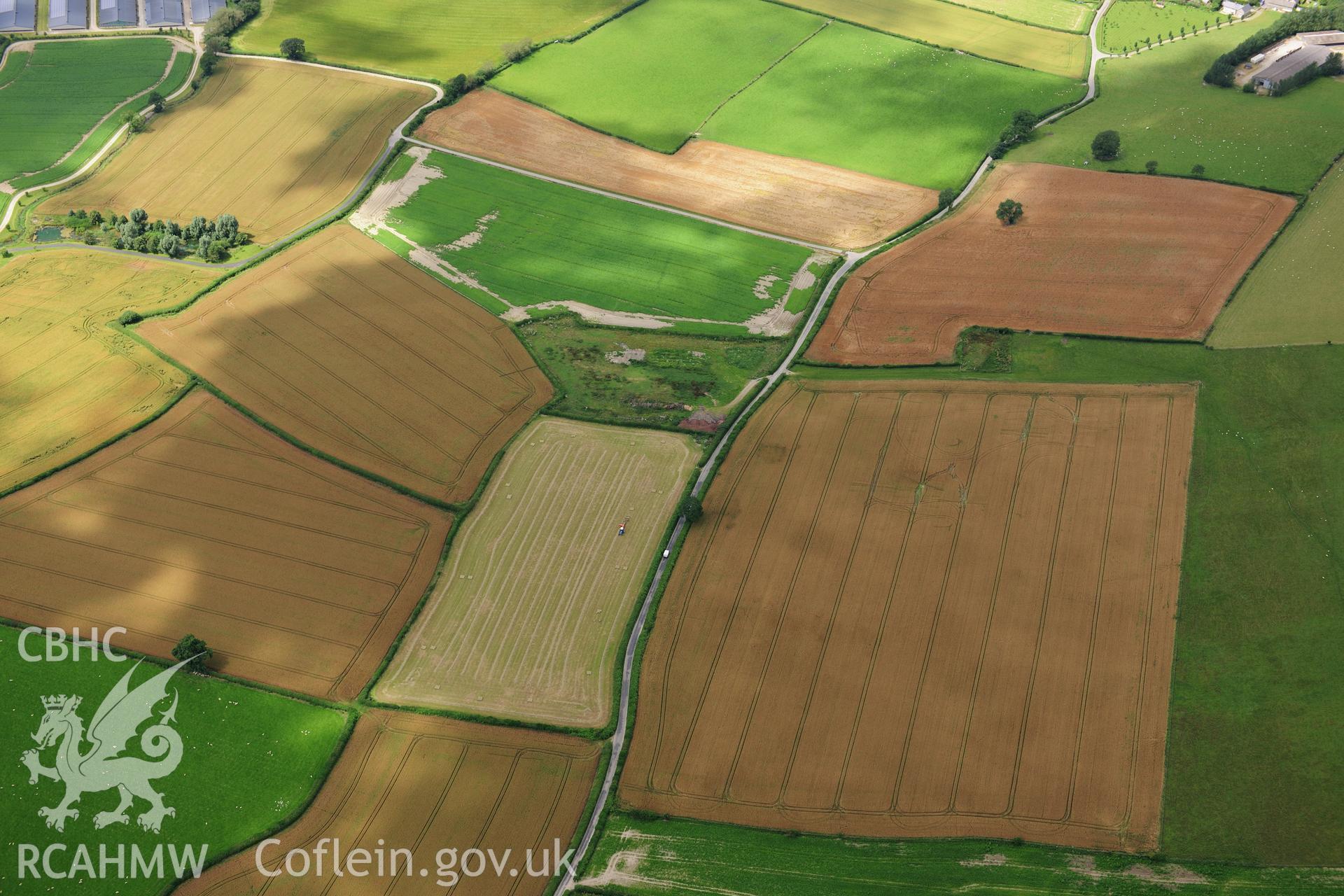 RCAHMW colour oblique photograph of North-east terminal of Hindwell Cursus, site of. Taken by Toby Driver on 27/07/2012.