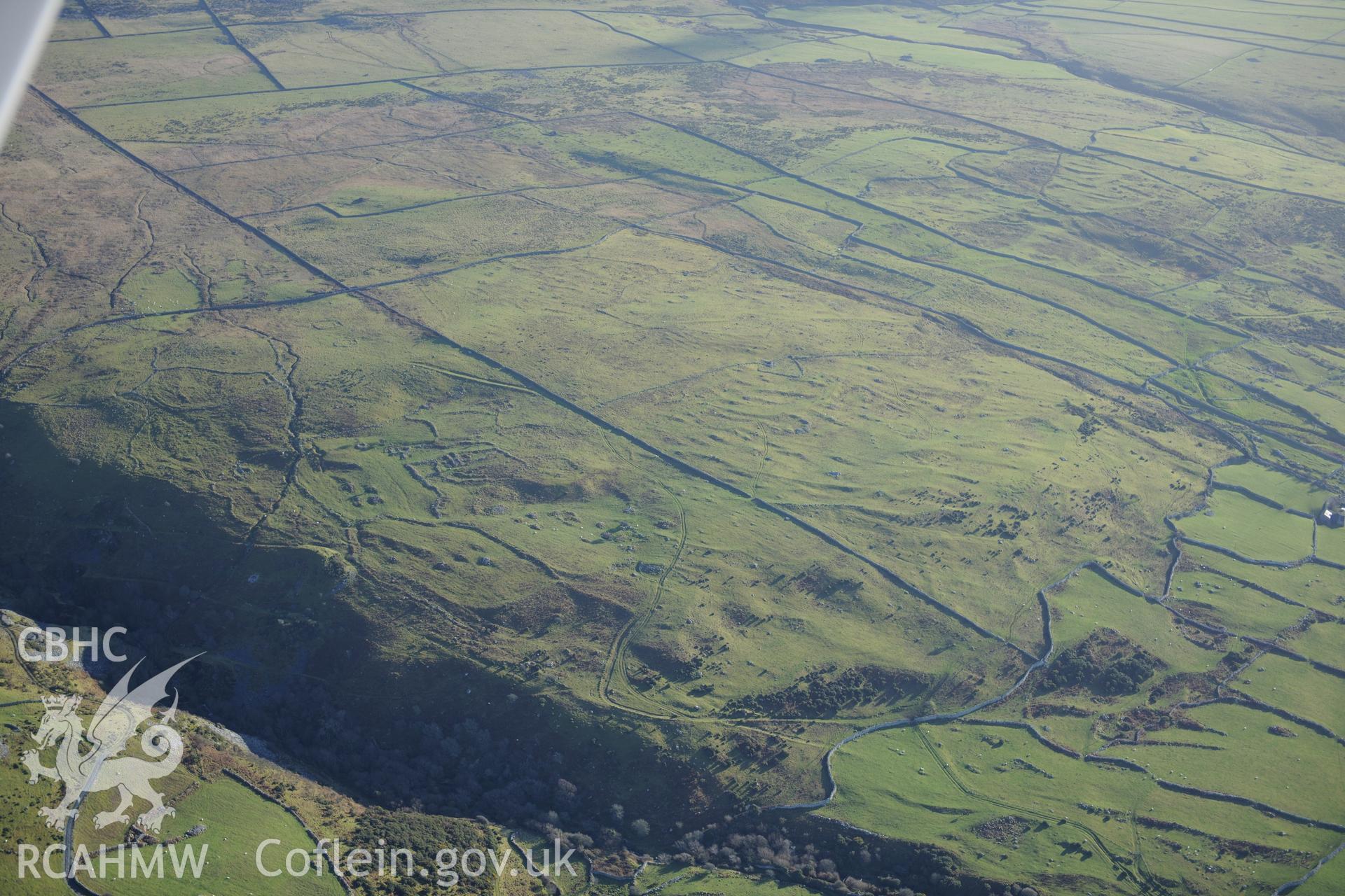 RCAHMW colour oblique photograph of Mynydd Egryn, settlement and field system. Taken by Toby Driver on 10/12/2012.