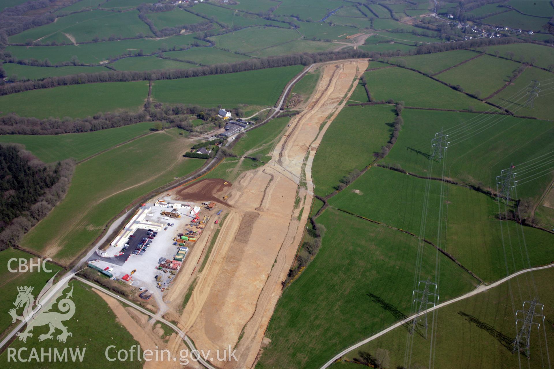 RCAHMW colour oblique photograph of A477 Bypass, west of Pentrehowell. General view with main depot for works. Taken by Toby Driver and Oliver Davies on 28/03/2012.