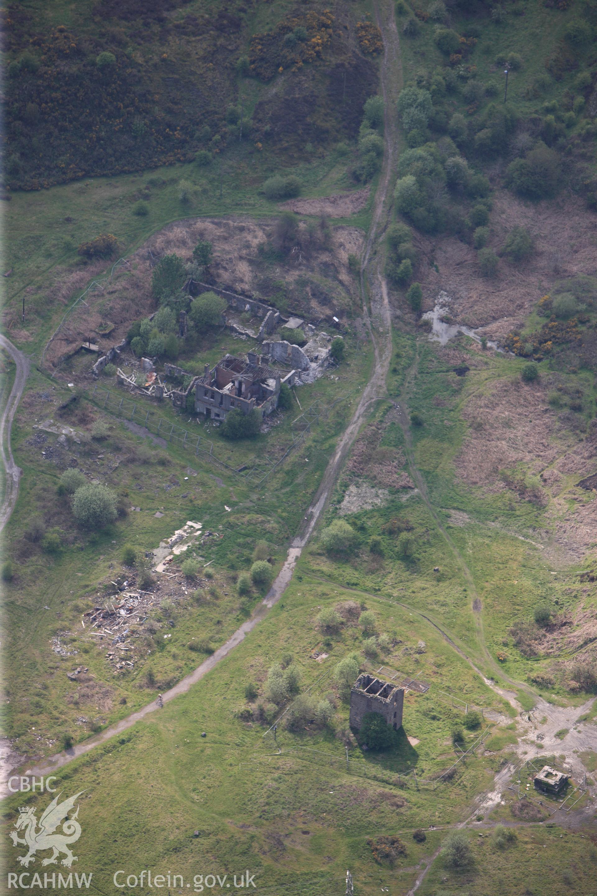 RCAHMW colour oblique photograph of British Ironworks, offices and workshops, with Pumping Engine House. Taken by Toby Driver on 22/05/2012.