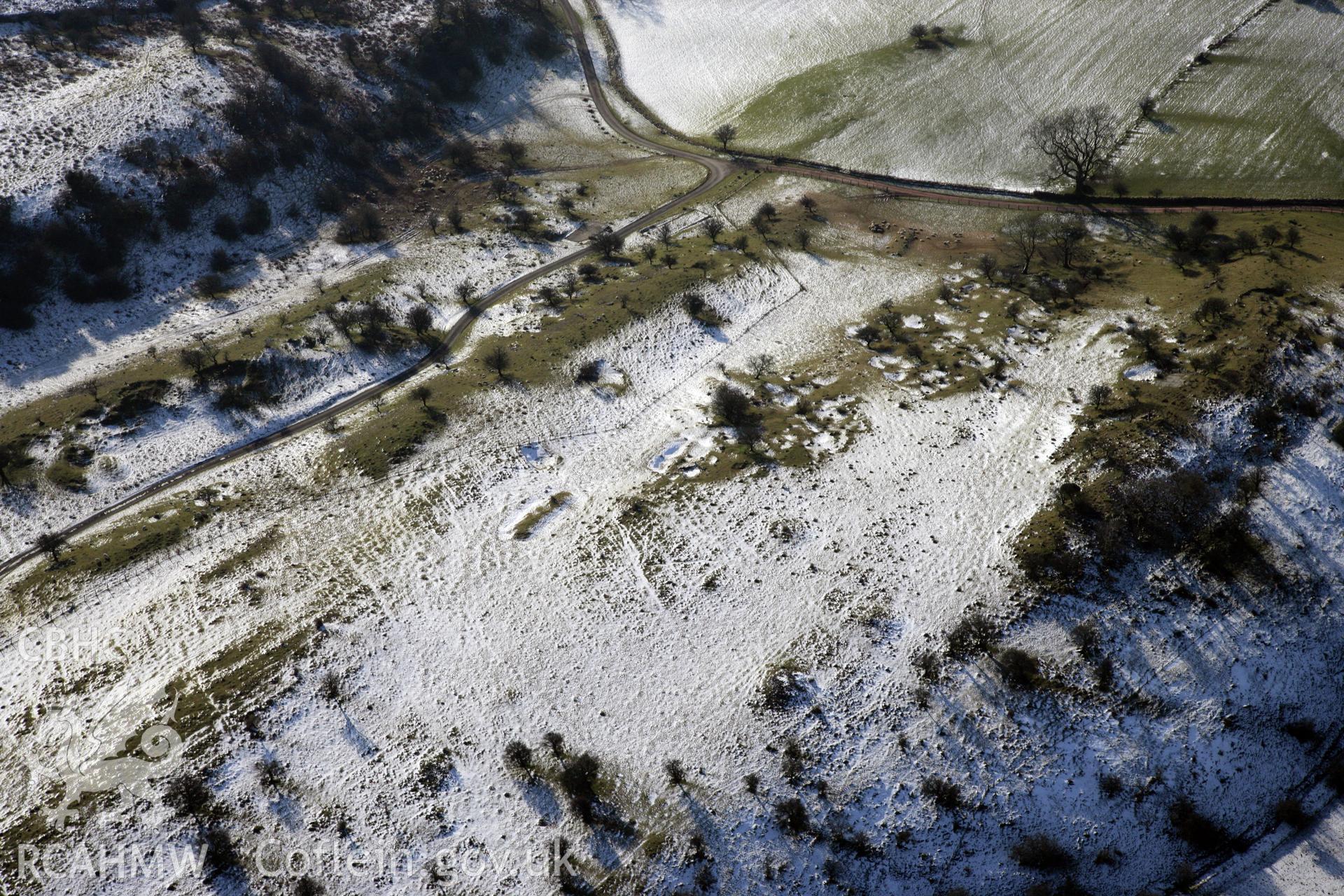 RCAHMW colour oblique photograph of Beddau'r Derwyddon Pillow Mound B. Taken by Toby Driver on 02/02/2012.