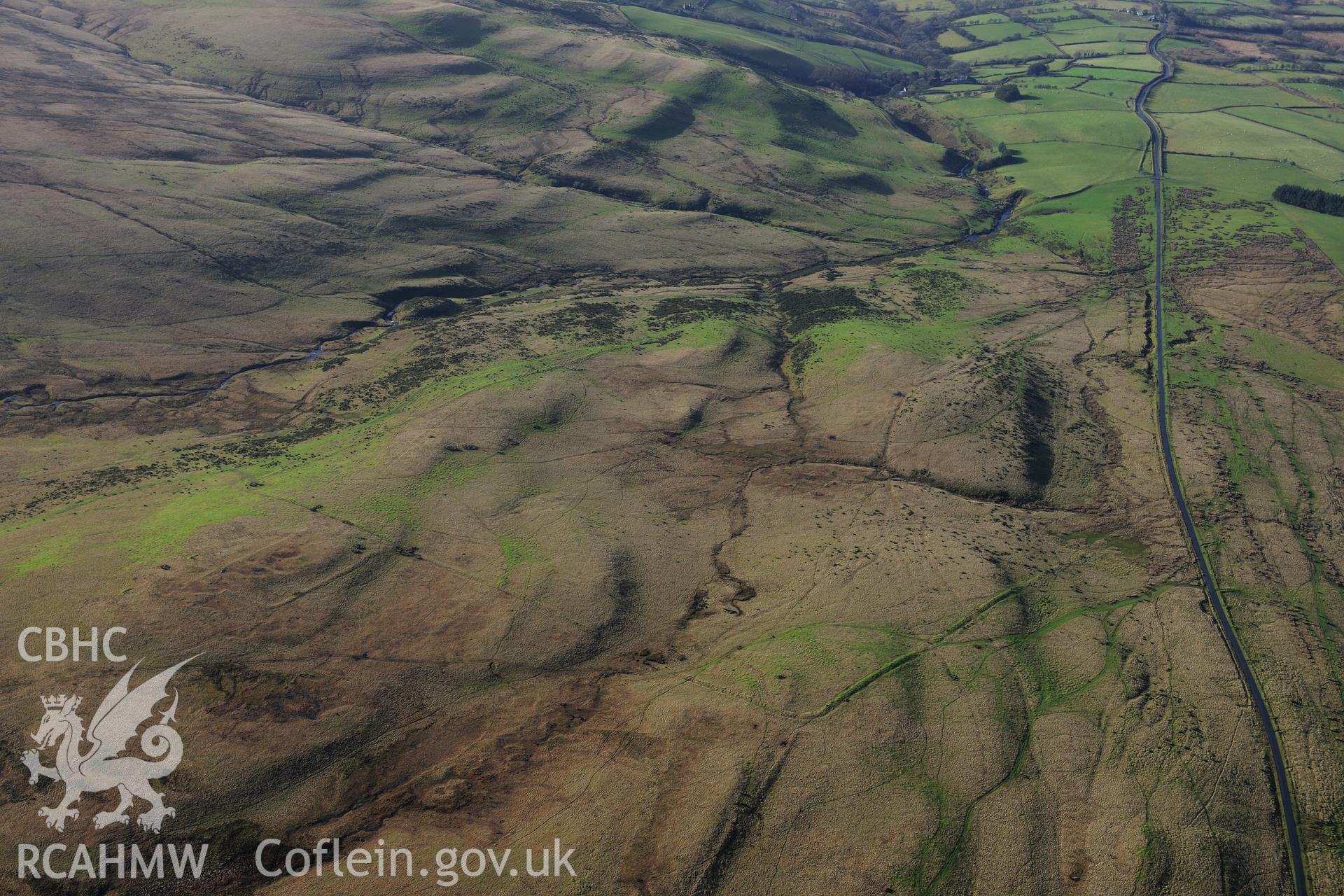 RCAHMW colour oblique photograph of Arosfa Garreg Lwyd Roman camp, view from east. Taken by Toby Driver on 23/11/2012.