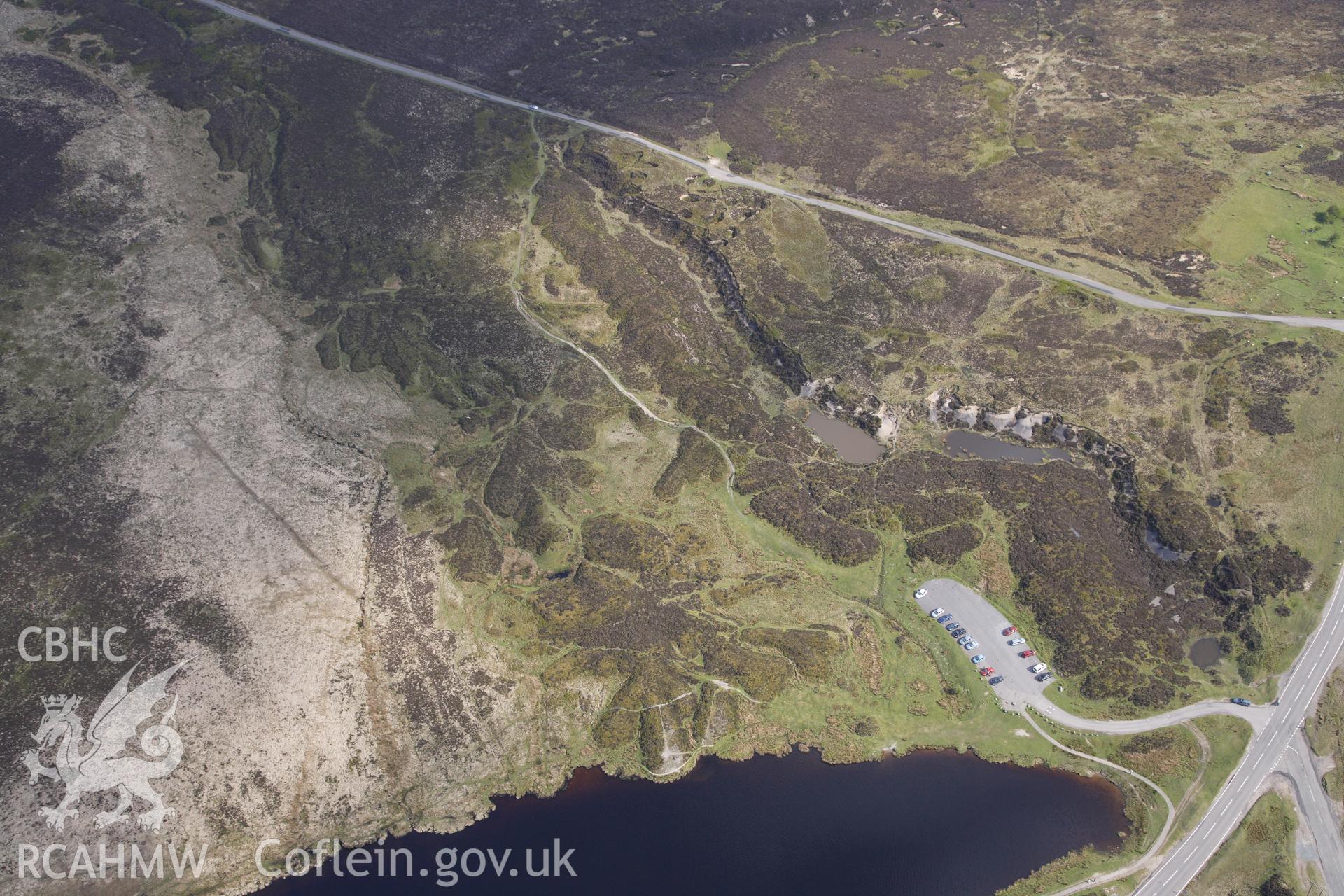 RCAHMW colour oblique photograph of Pen-ffordd-goch iron and coal workings and patching. Taken by Toby Driver on 22/05/2012.