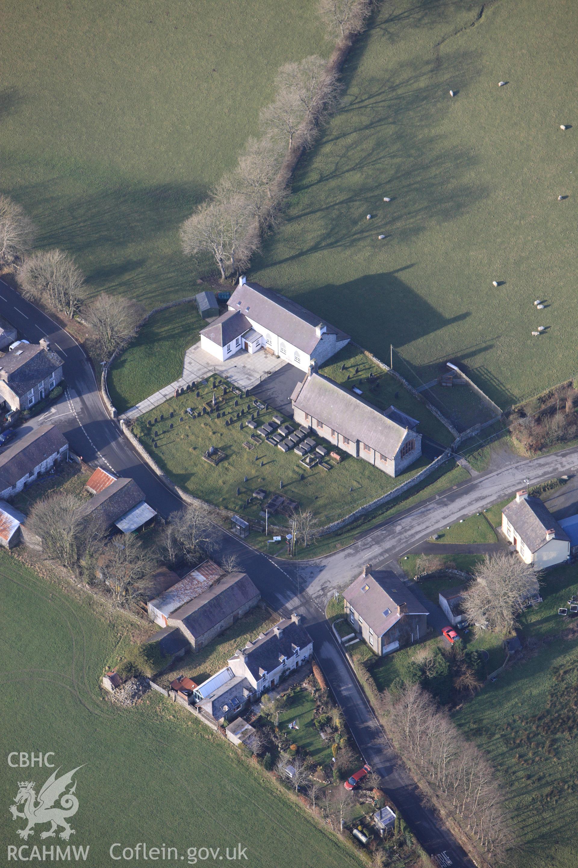 RCAHMW colour oblique photograph of St John the Baptist Church, Ystrad Meurig. Taken by Toby Driver on 07/02/2012.