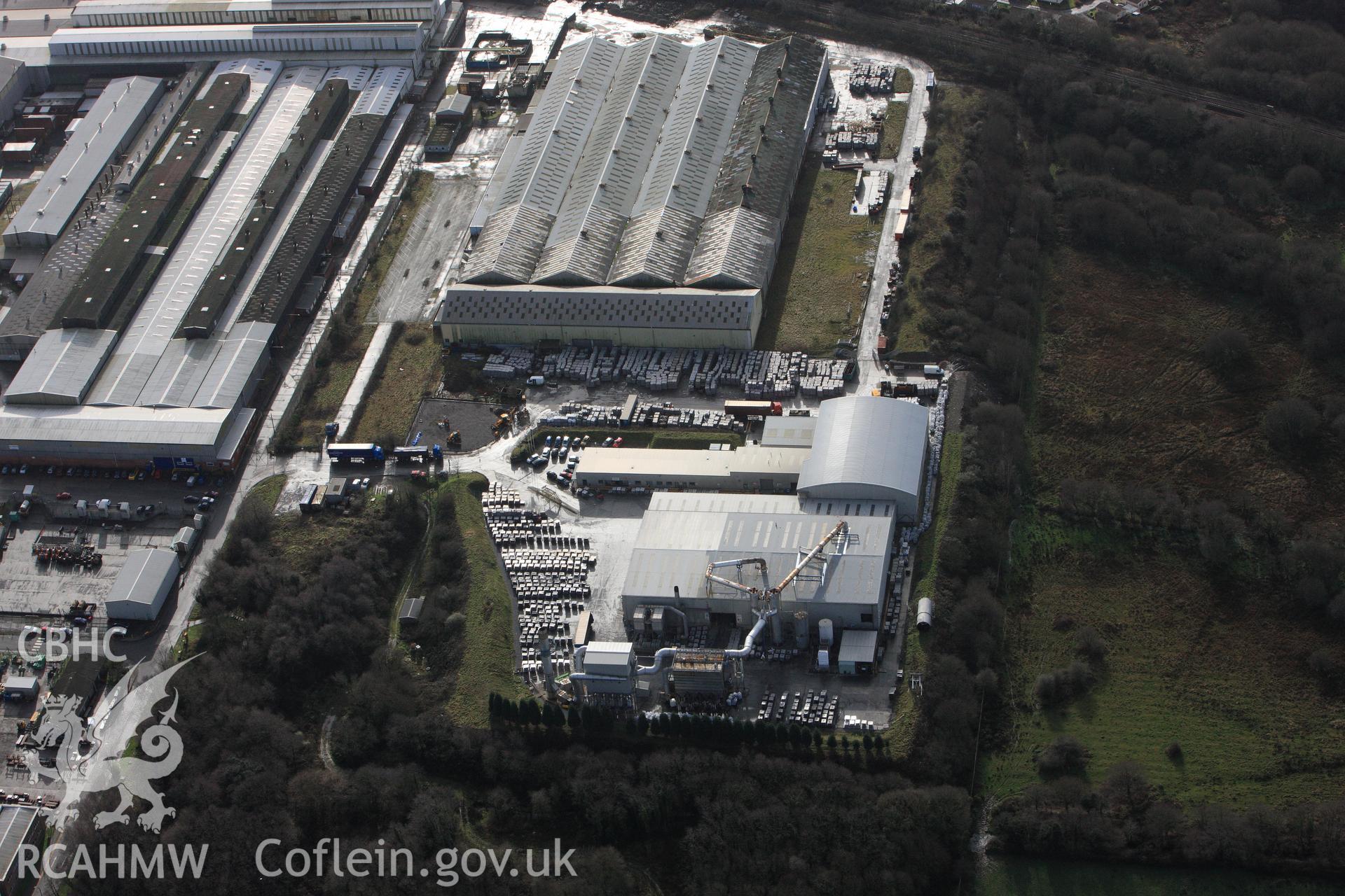 RCAHMW colour oblique photograph of ICI Metal Works (Alcoa Factory), Waunarlwydd, Gowerton. Taken by Toby Driver on 27/01/2012.