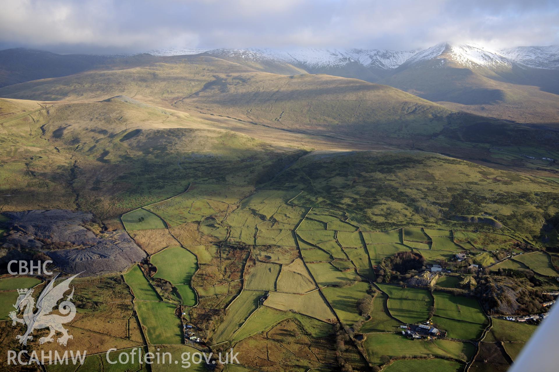 RCAHMW colour oblique photograph of Moel Faban early agricultural landscape, Llanllechid. Taken by Toby Driver on 10/12/2012.