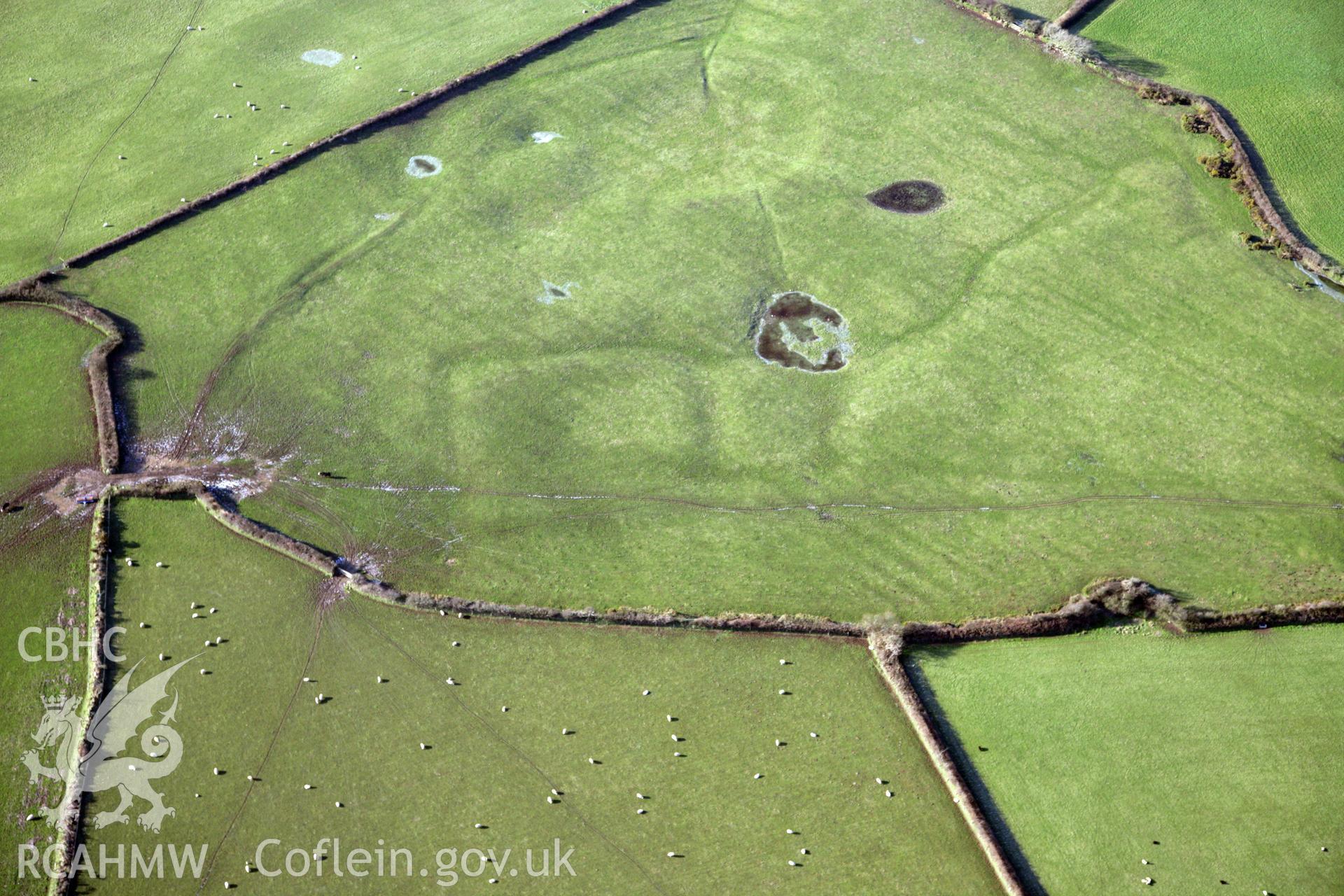 RCAHMW colour oblique photograph of Llanddewi Enclosure. Taken by Toby Driver on 02/02/2012.