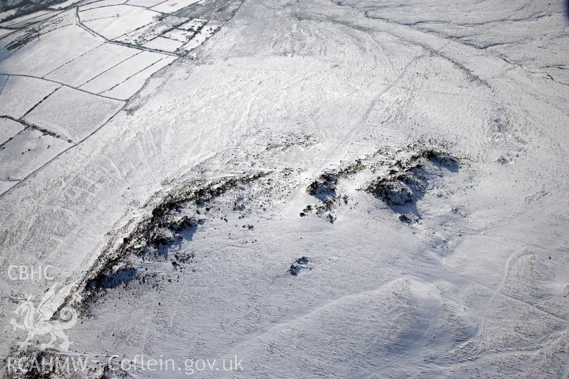 RCAHMW colour oblique photograph of Carn Meini Bluestone Outcrops of Spotted Dolerite. Taken by Toby Driver on 02/02/2012.