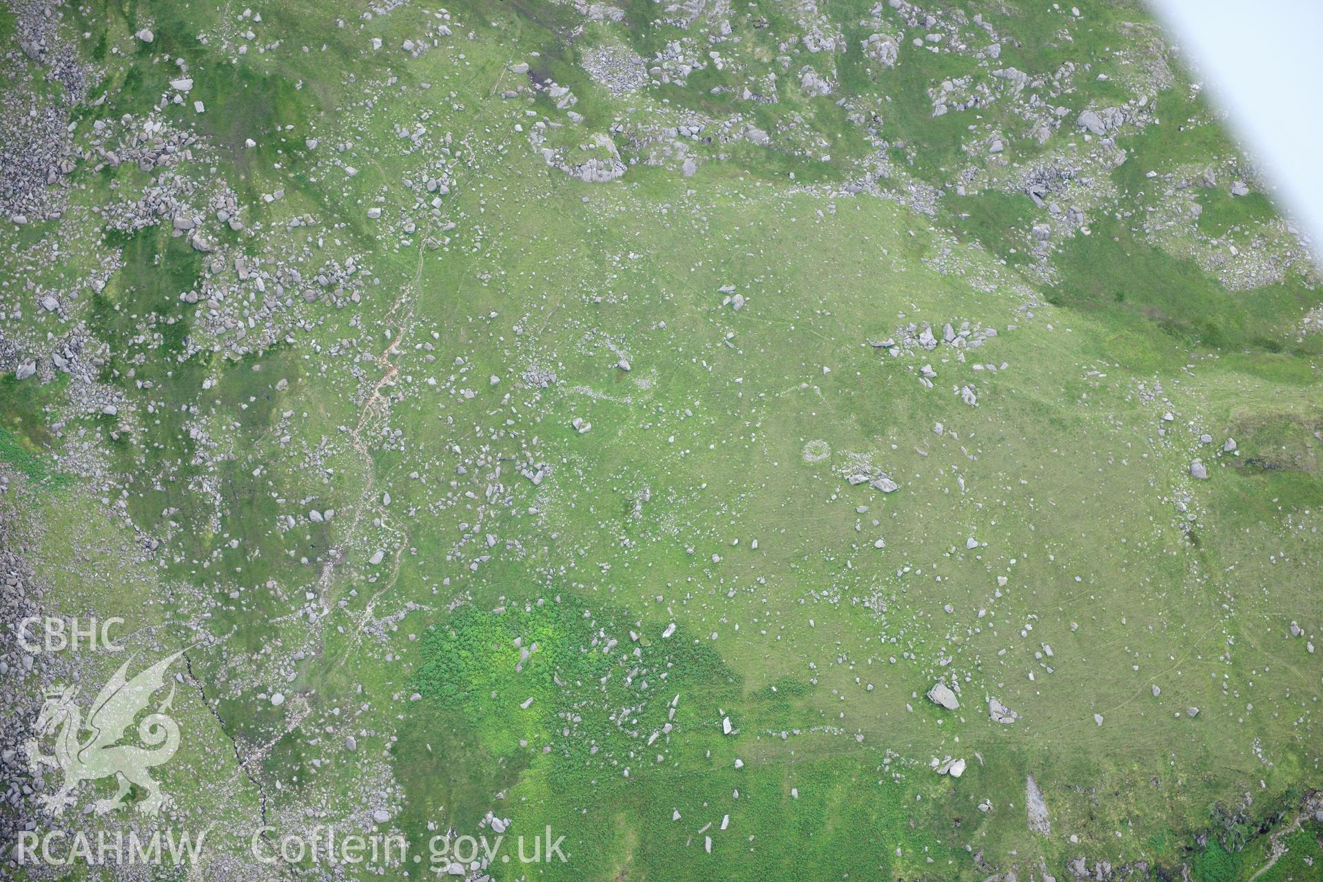 RCAHMW colour oblique photograph of hut circles, Nant Bochlwyd. Taken by Toby Driver on 10/08/2012.