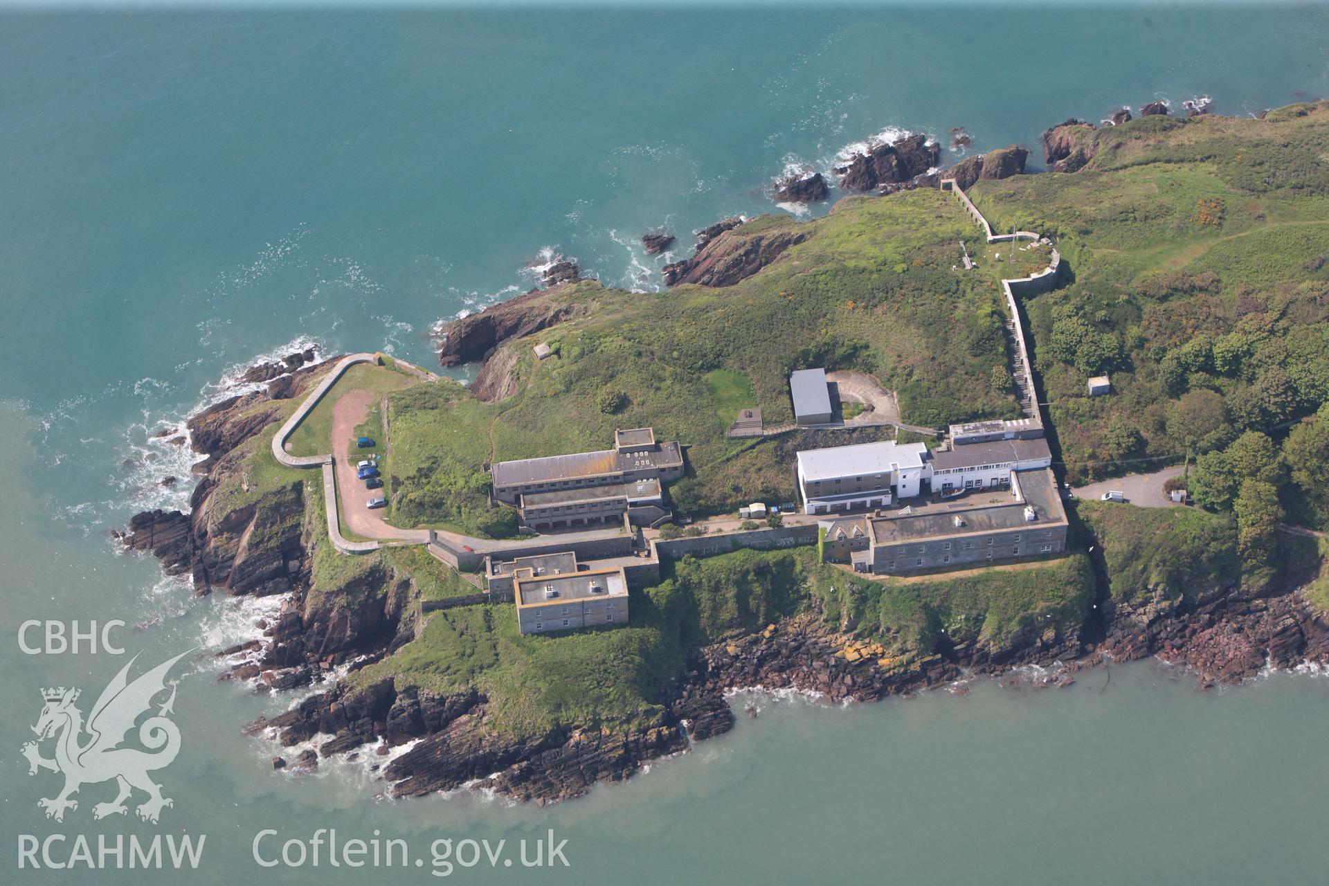 RCAHMW colour oblique photograph of General view of Dale Point promontory fort, looking west. Taken by Toby Driver on 24/05/2012.