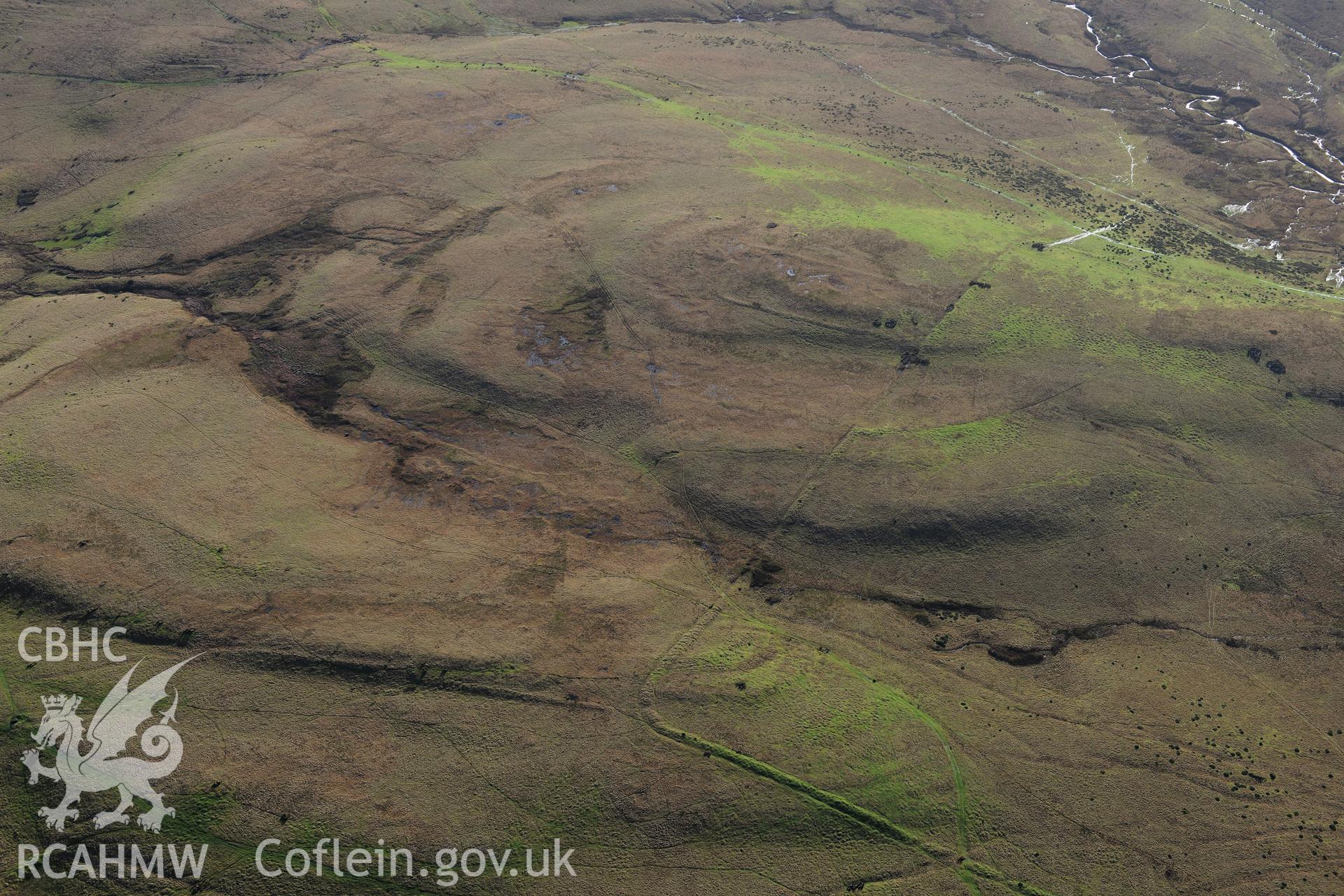 RCAHMW colour oblique photograph of Arosfa Garreg Lwyd Roman camp. Taken by Toby Driver on 23/11/2012.