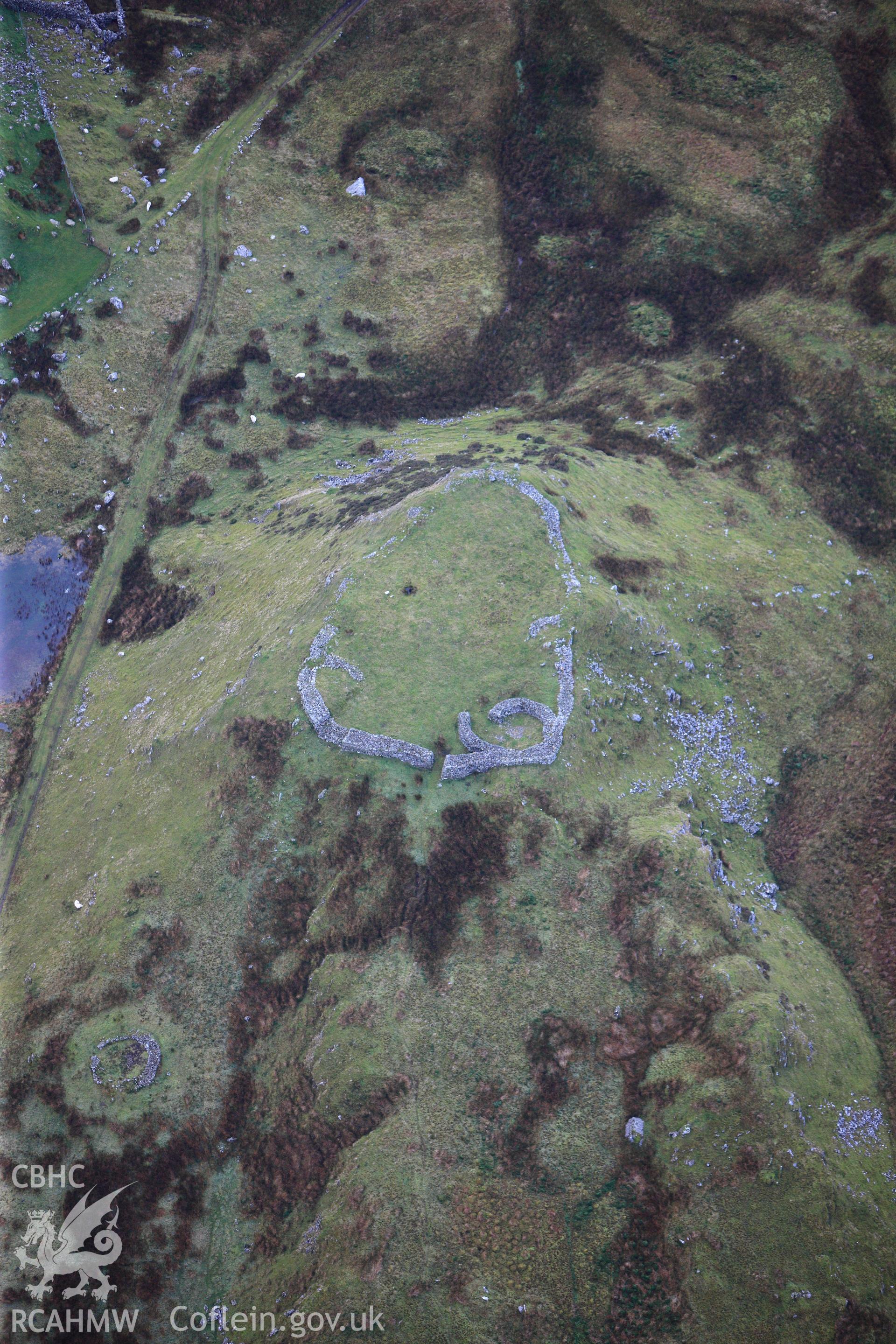 RCAHMW colour oblique photograph of Bryn y Castell hillfort. Taken by Toby Driver on 13/01/2012.