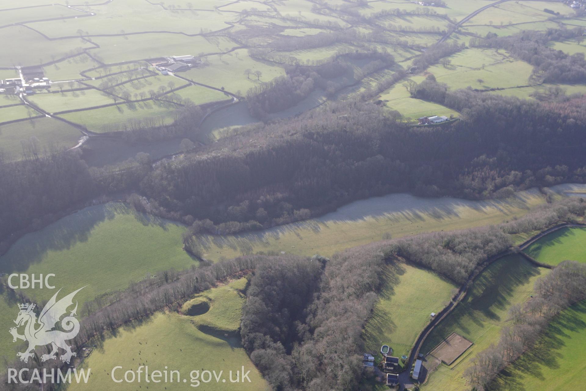 RCAHMW colour oblique photograph of Allt y Ferin, earthwork castle. Taken by Toby Driver on 27/01/2012.