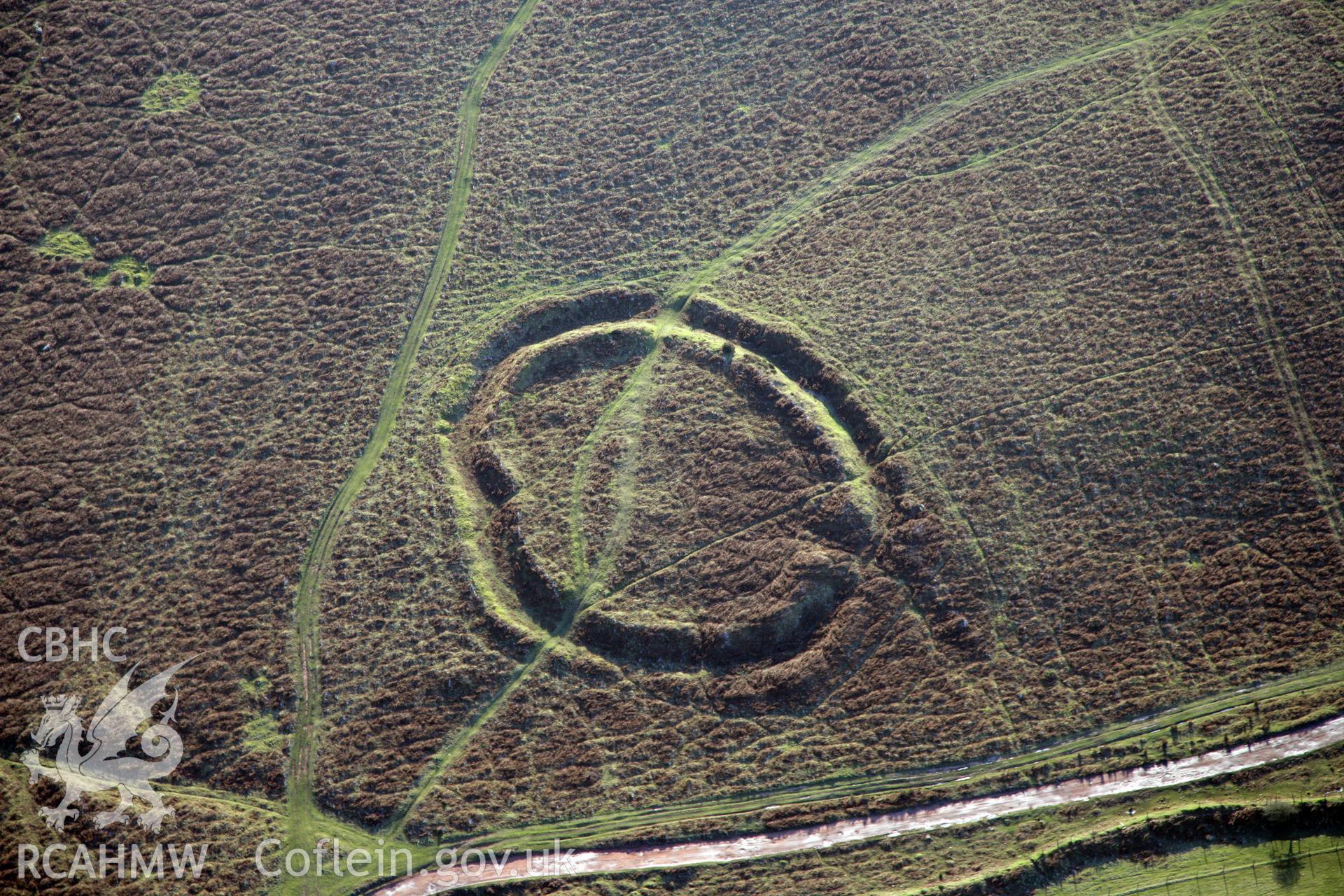 RCAHMW colour oblique photograph of Hardings Down, North Enclosure. Taken by Toby Driver on 02/02/2012.