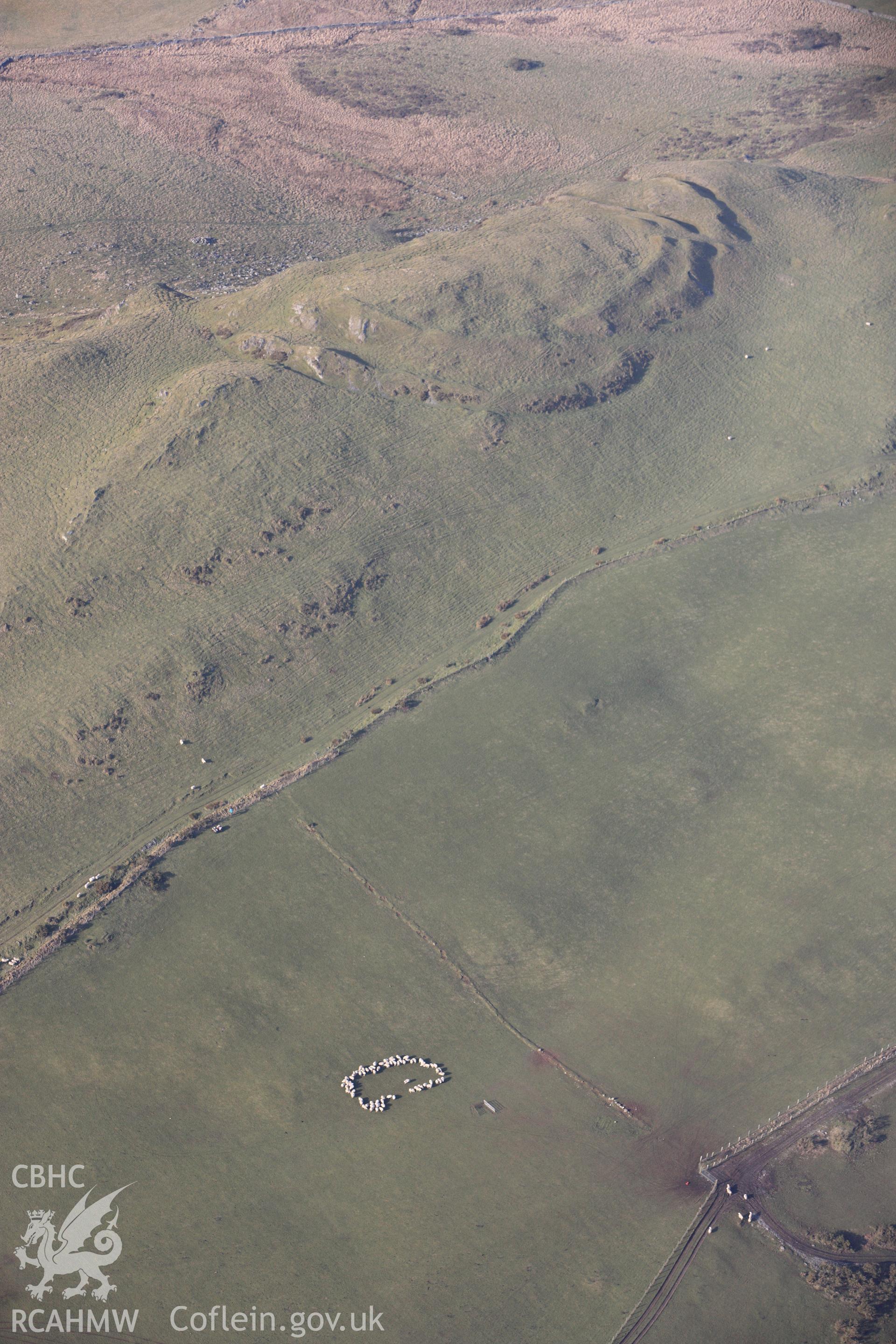 RCAHMW colour oblique photograph of Pen-Y-Ffrwyd Llwyd Hillfort. Taken by Toby Driver on 07/02/2012.