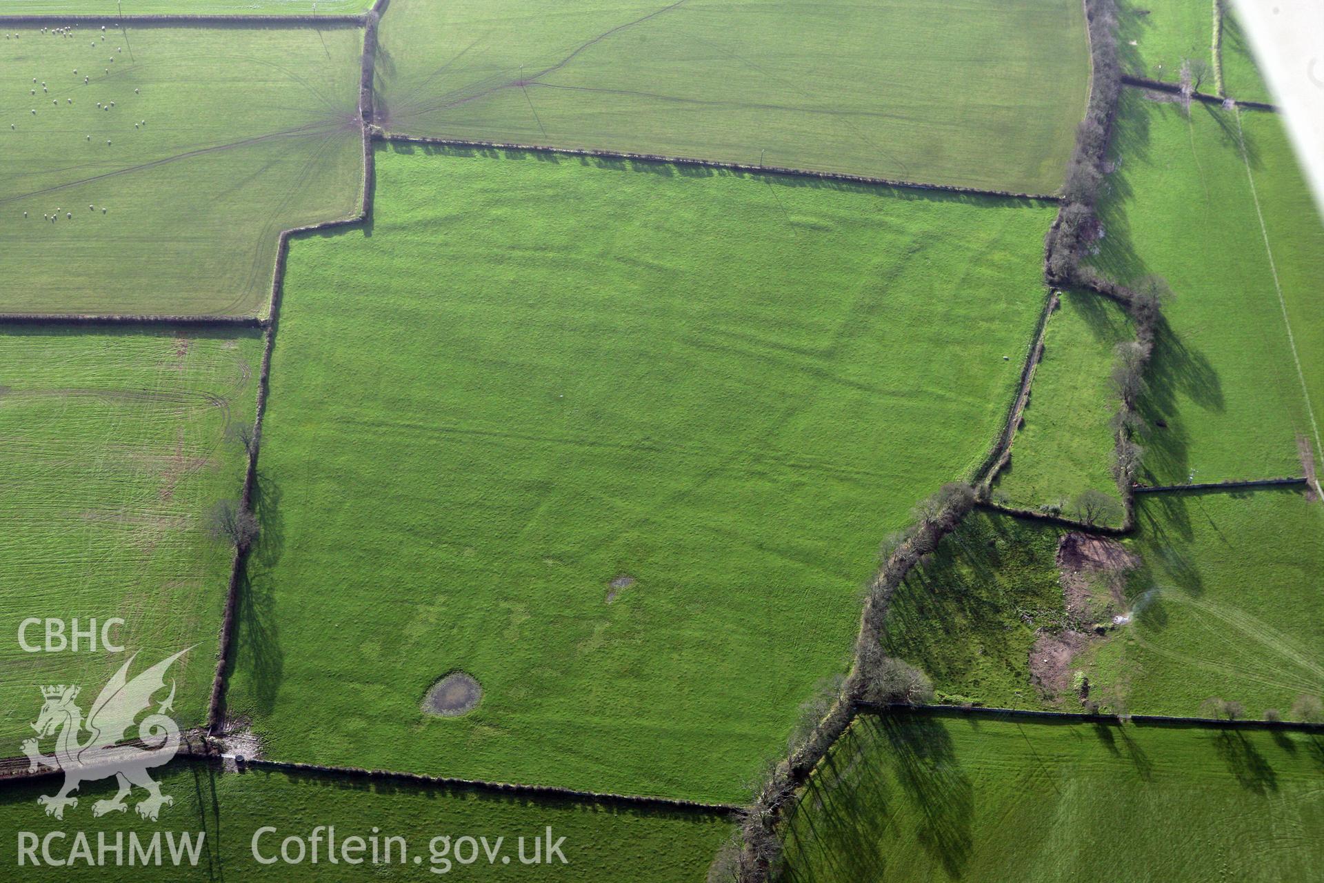 RCAHMW colour oblique photograph of Tai Cochion field system and settlement earthworks. Taken by Toby Driver on 13/01/2012.